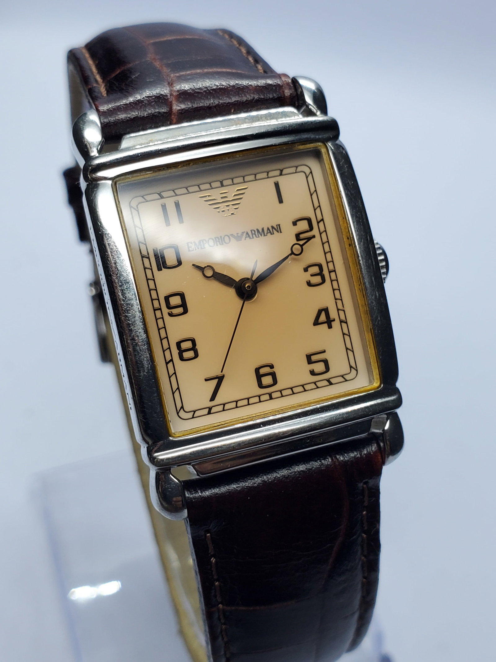 Vintage Emporio Armani Tank Case Champagne Dial Watch, 24x29mm, 2000s, Running: Elevate your collection with this elegant Emporio Armani AR0204 quartz dress watch, a refined designer timepiece that blends Italian fashion heritage with timeless sophistication. Founded by Giorgio A