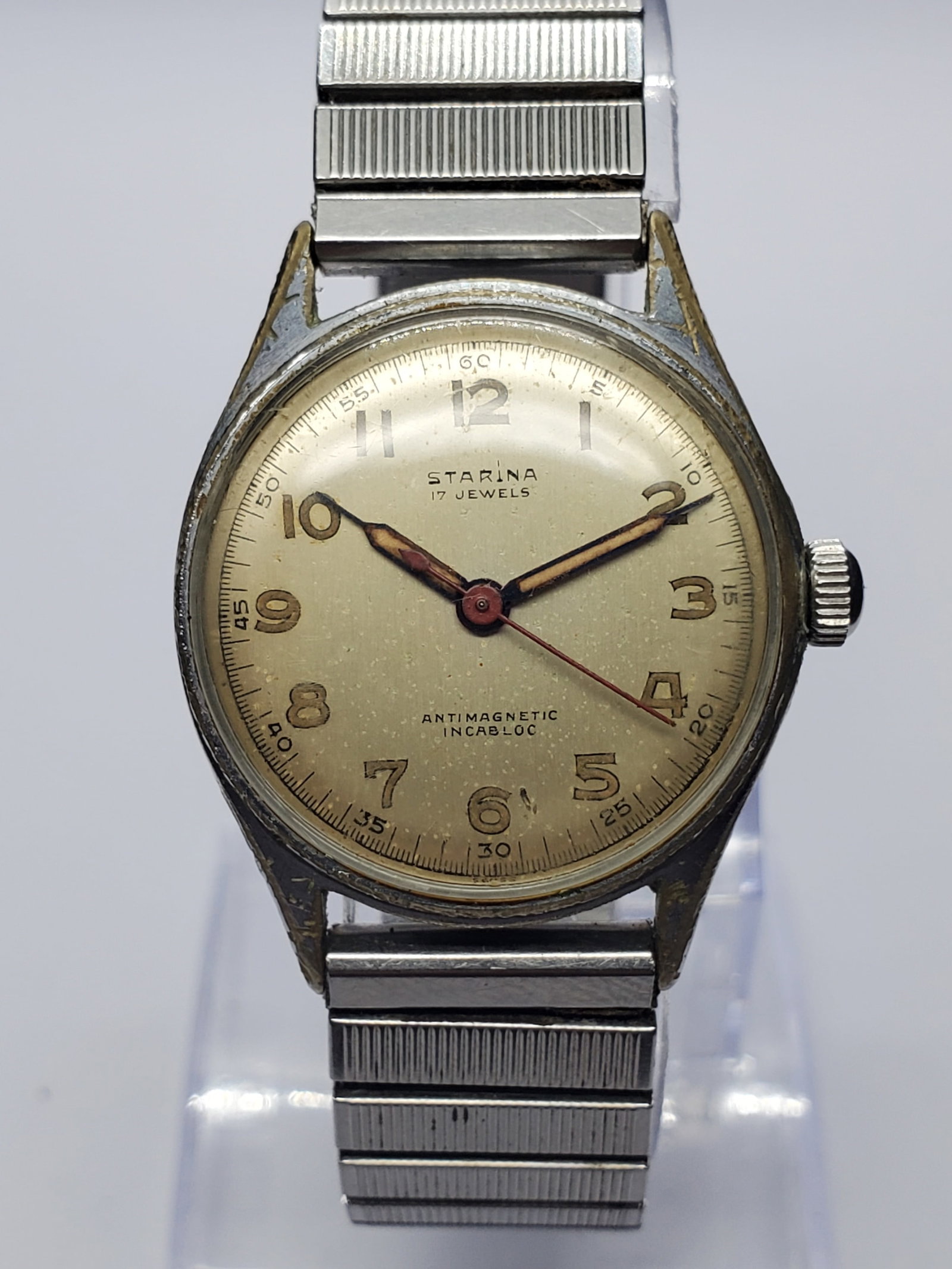 Vintage Starina 17 Jewels Swiss Military Style Manual Watch, 29mm, 1950s, Running: Classic and dependable, this vintage Starina 17 Jewels Swiss manual wind military style wristwatch captures the functional elegance of mid century Swiss watchmaking. Starina was one of the many smalle