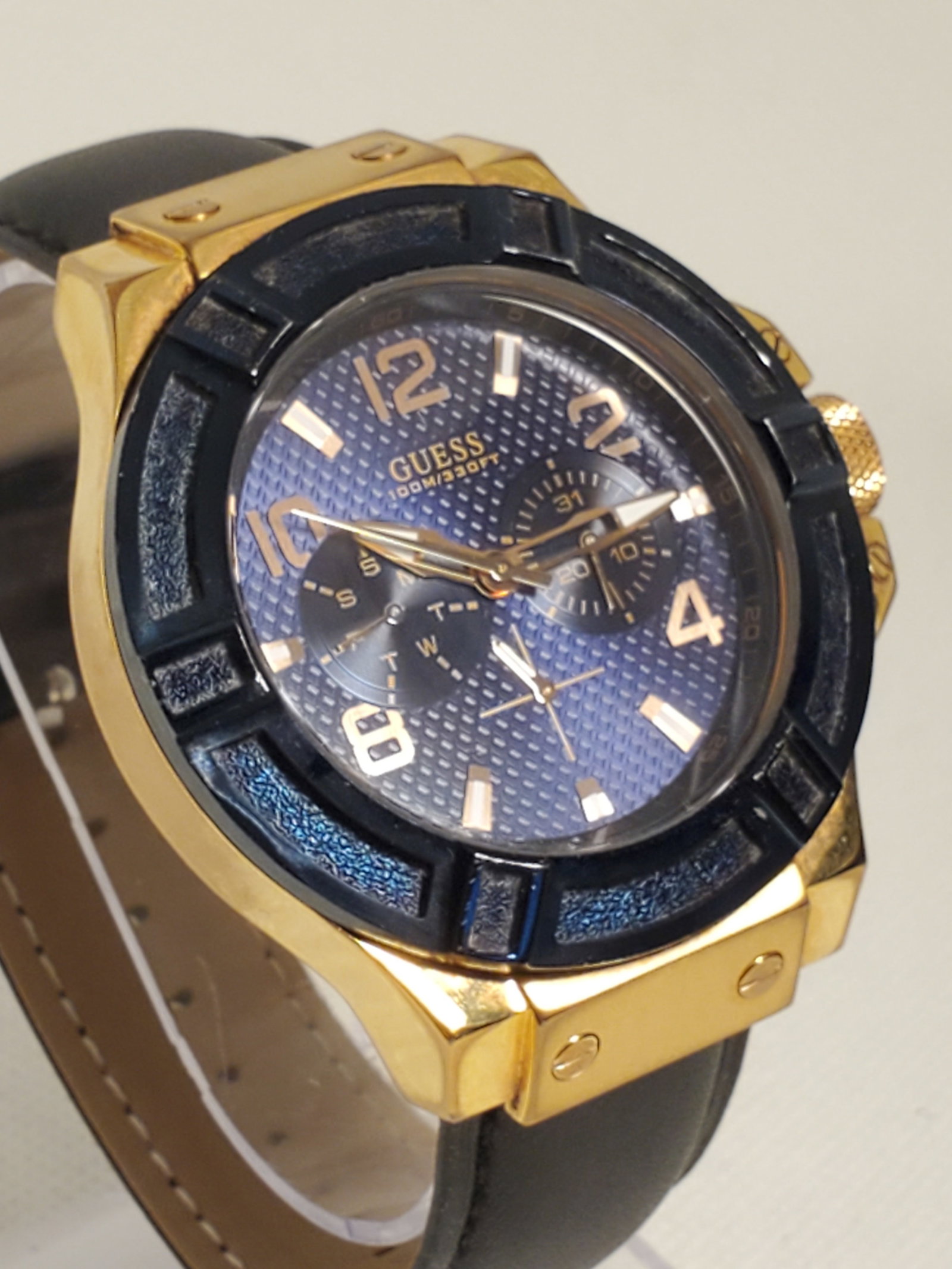 Vintage Guess Sport U0247G3 Rose Gold Blue Dial Chronograph Style Quartz Watch, 2015 to 2018,: This bold Guess Sport U0247G3 watch blends modern elegance with a strong sporty character, featuring a rose gold tone case paired with a deep blue bezel and textured blue dial that delivers high visua