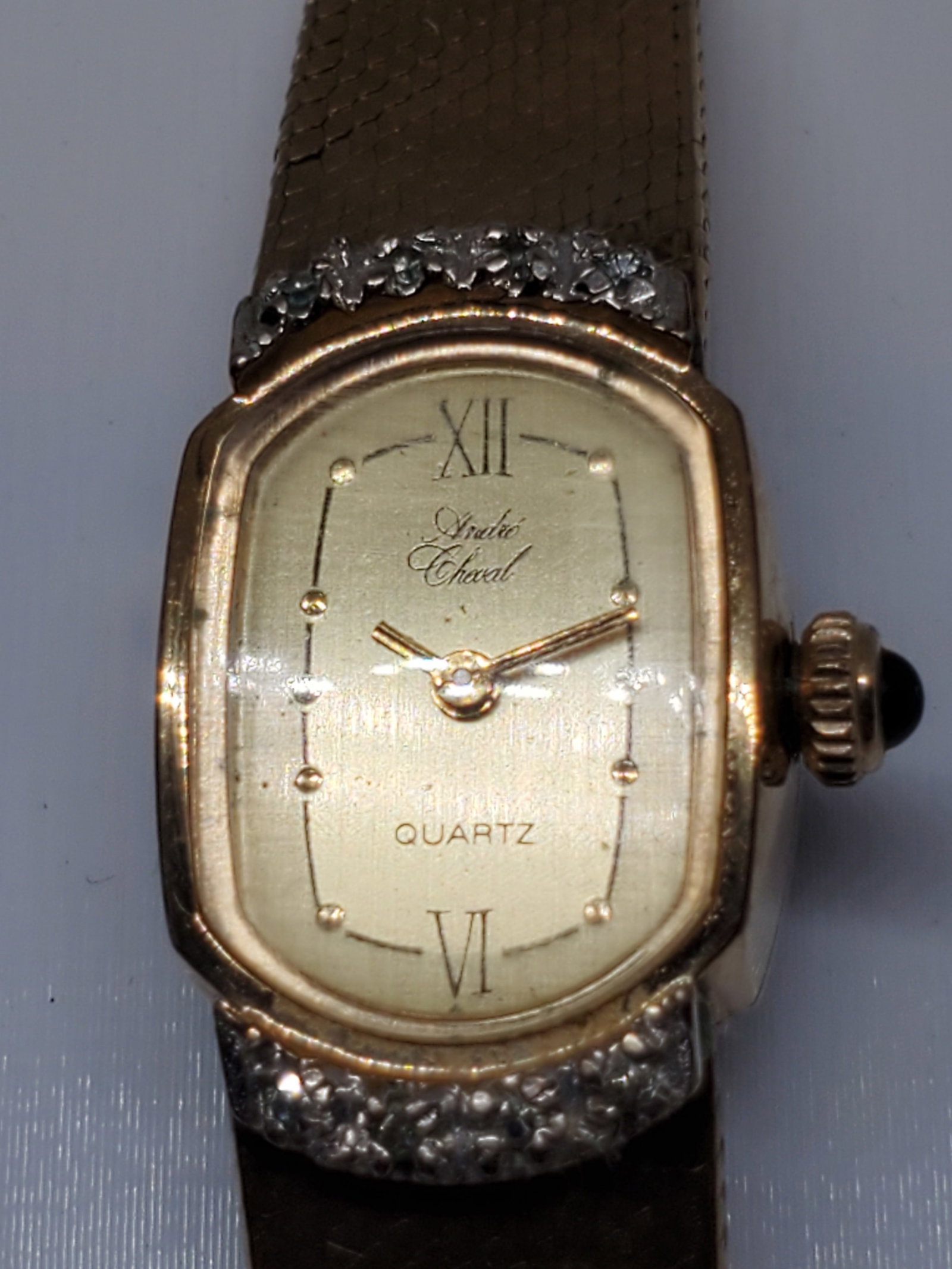 Vintage Andre Cheval Gold Plated with Diamonds Watch, 1980s, Running: Running condition Andre Cheval Luxury Watch, an exquisite blend of elegance and timeless sophistication that reflects the prestige and artistry synonymous with the brand. This quartz powered timepiece