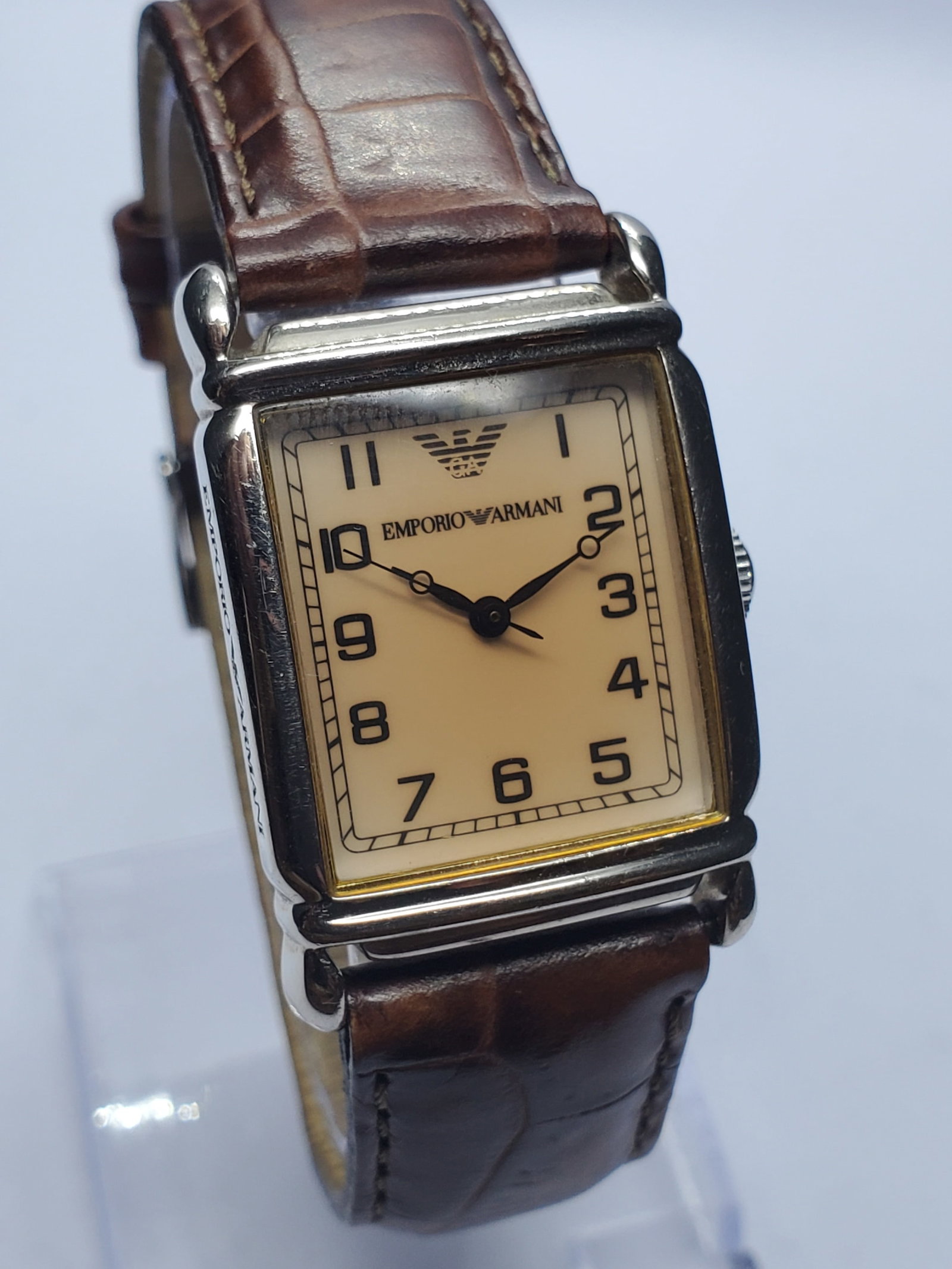 Vintage Emporio Armani Tank Case Champagne Dial Watch, 24x29mm, 2000s, Running: Elevate your collection with this elegant Emporio Armani AR0204 quartz dress watch, a refined designer timepiece that blends Italian fashion heritage with timeless sophistication. Founded by Giorgio A