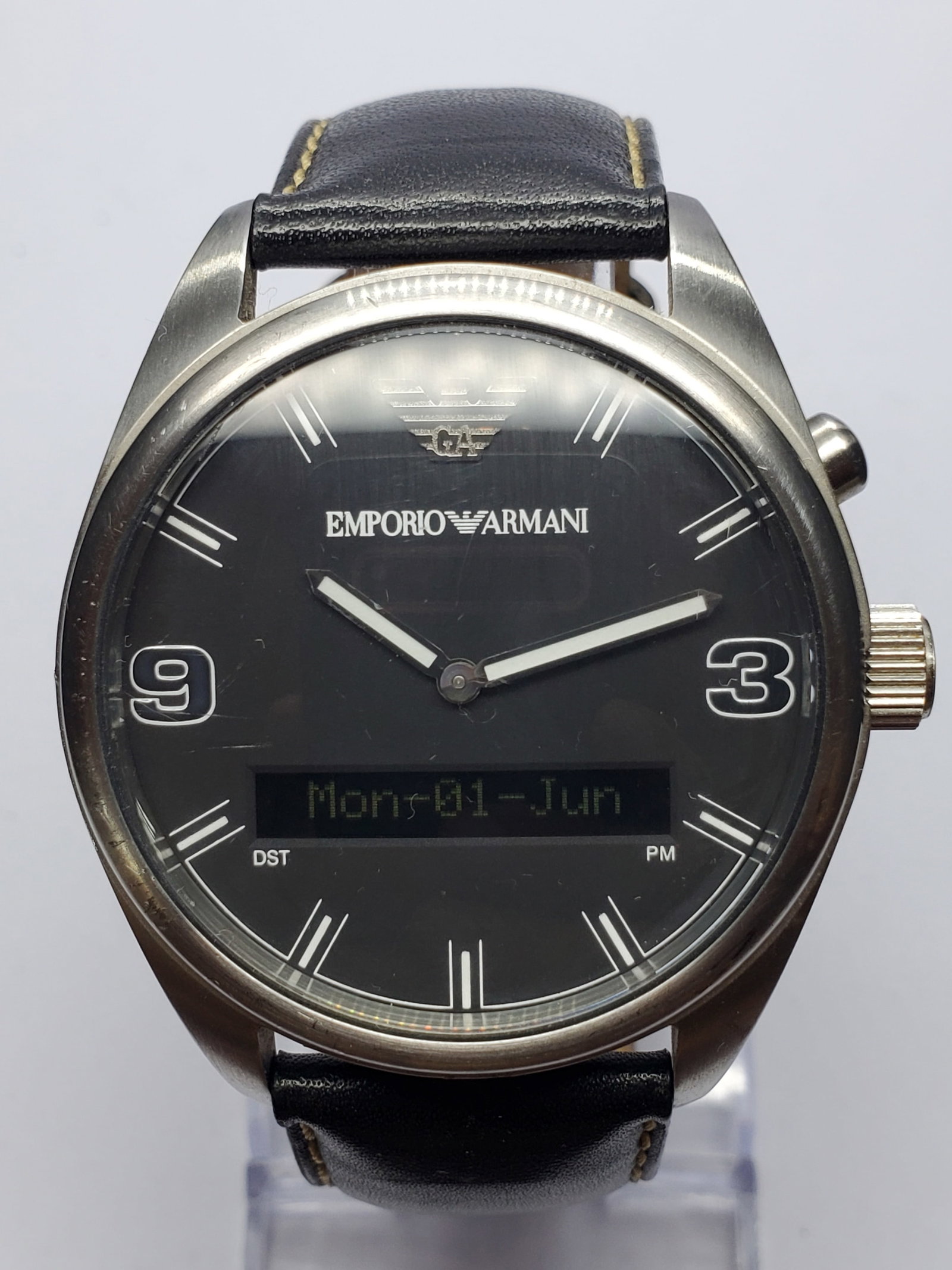 Vintage Emporio Armani Hybrid Analog-Digital Sport Black Dial Watch, 44mm, 2000s, Running: Bold, modern, and unmistakably stylish, this Emporio Armani AR 0511 Hybrid Quartz Sport Watch blends classic analog elegance with practical digital functionality. Founded by Giorgio Armani in 1975 in 