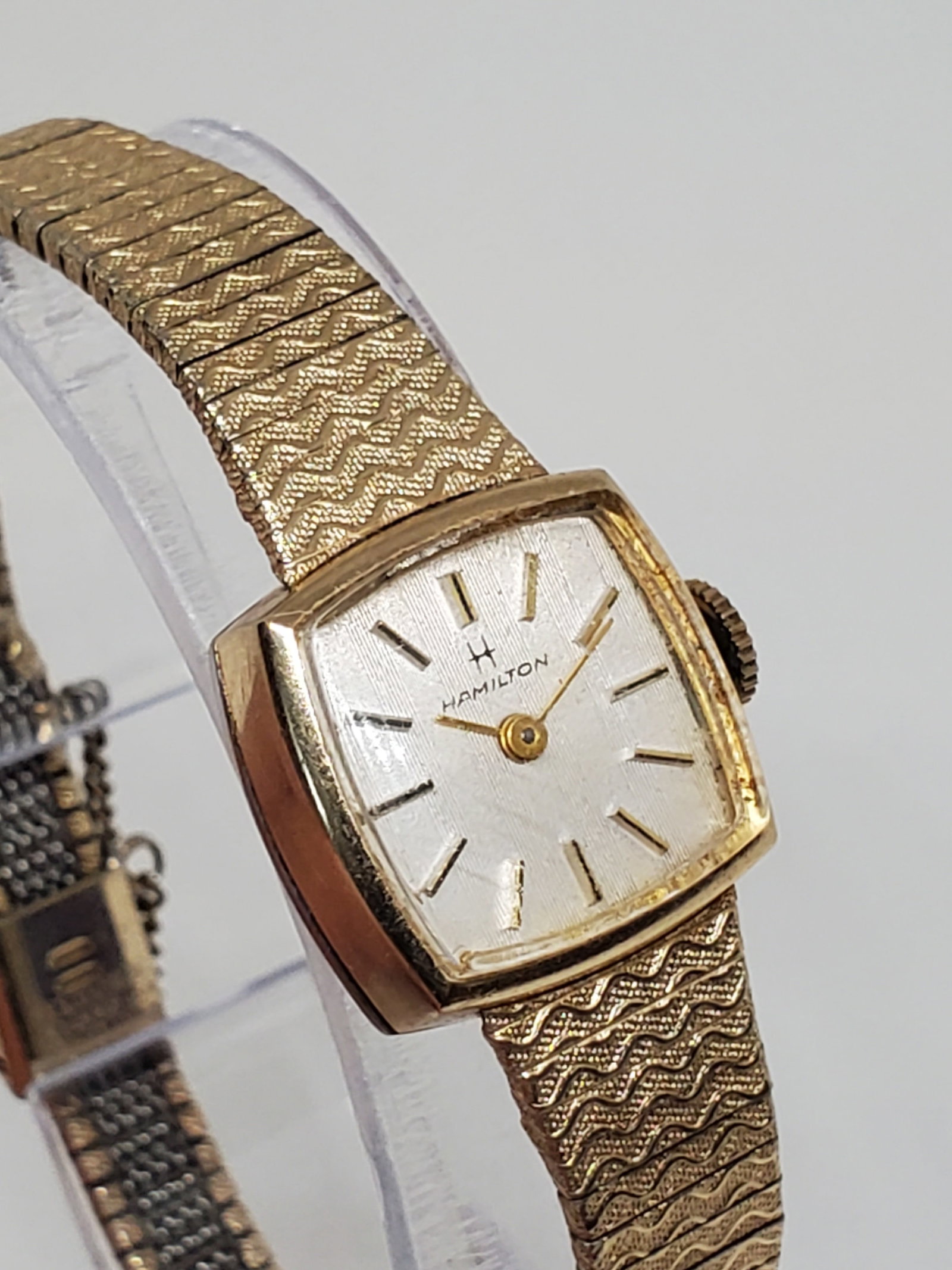 Vintage Hamilton Rolled Gold Plated Manual Watch 139956, 1960s, Running: Running condition Hamilton 139956 luxury watch. Its sleek rolled gold plated case and sophisticated silver dial exude class and refinement, perfect for any discerning collector or wearer. Powered by a