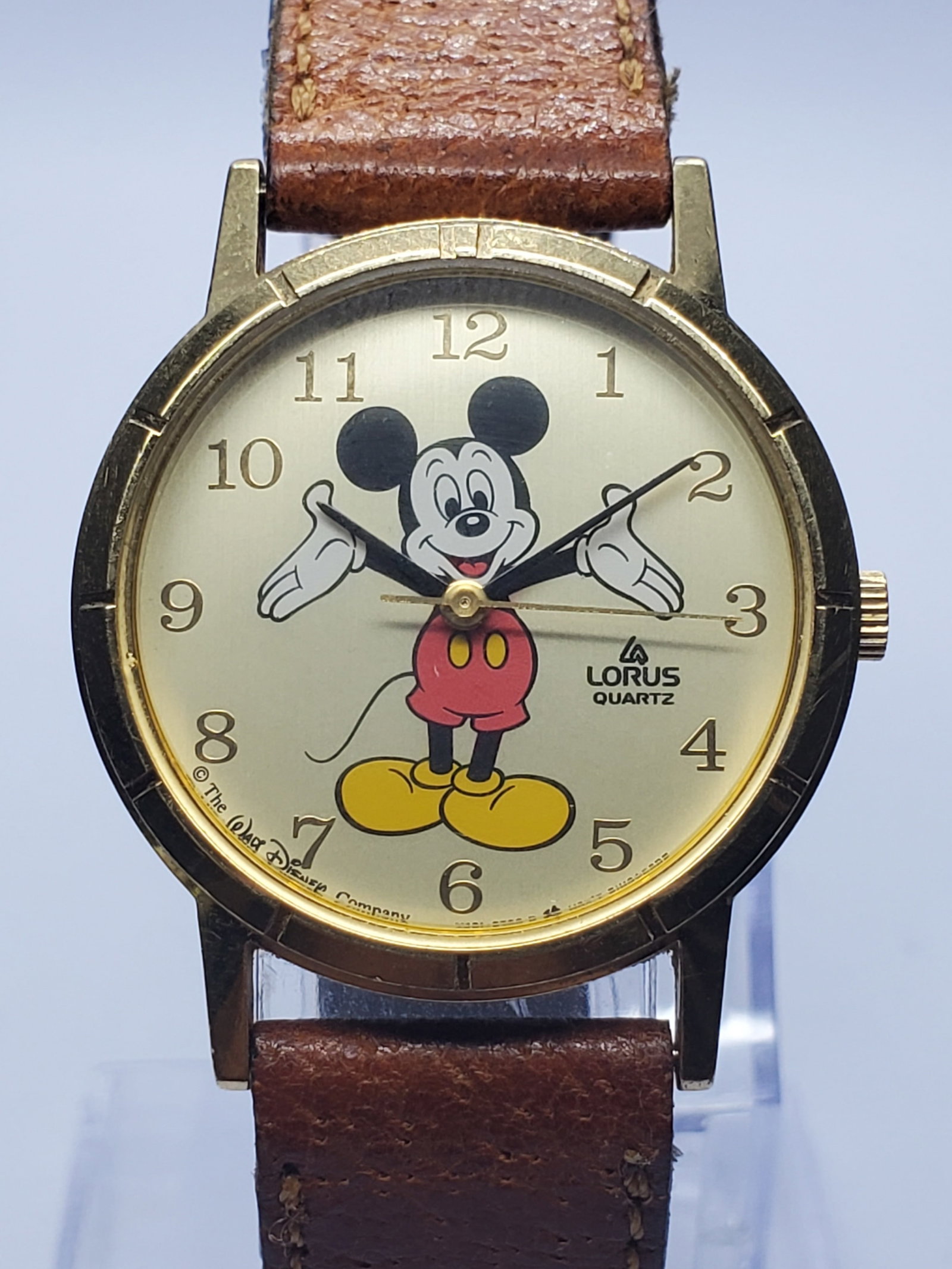 Vintage Lorus Seiko Mickey Mouse Disney Quartz Watch, 30mm, 1990s, Running: This charming vintage Lorus Disney quartz watch by Seiko captures timeless elegance with a playful collectible twist, featuring a gold plated case and a light yellow dial showcasing the iconic Mickey 