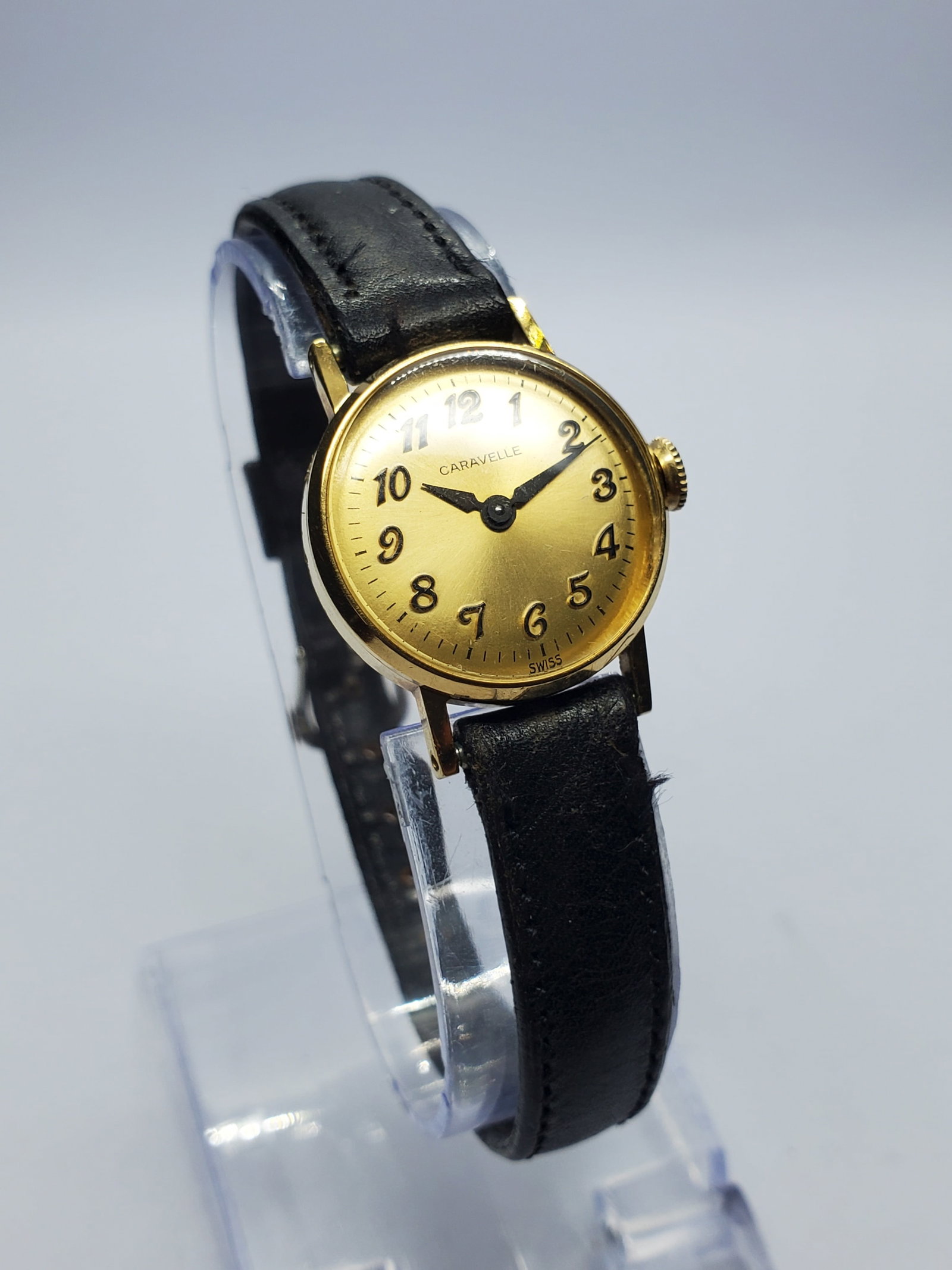 Vintage Bulova Caravelle Gold Plated Manual Watch Classic, 1973, Running: This vintage Bulova Caravelle N3 manual watch captures timeless elegance with its warm gold dial and refined minimalist design, complemented by a gold plated 14K case that enhances its classic dress a