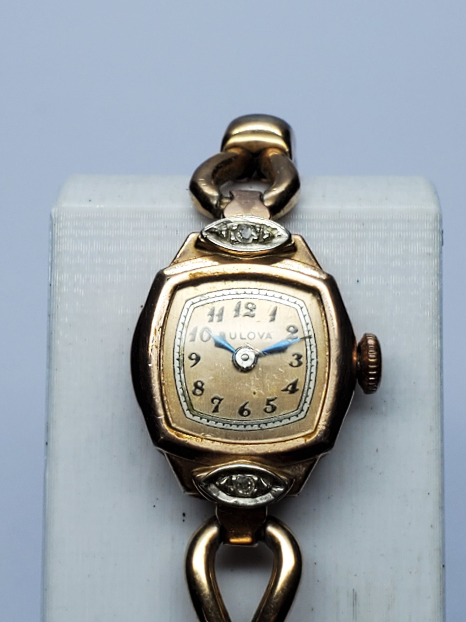 Vintage Bulova 6AH 14K RGP Diamond Manual 17 Jewels Watch, 16x21mm, 1948-1952, Running: Celebrate classic American watchmaking with this elegant Bulova 6AH manual wind dress watch, a refined vintage piece showcasing timeless Art Deco inspired styling. Founded by Joseph Bulova in 1875 in 