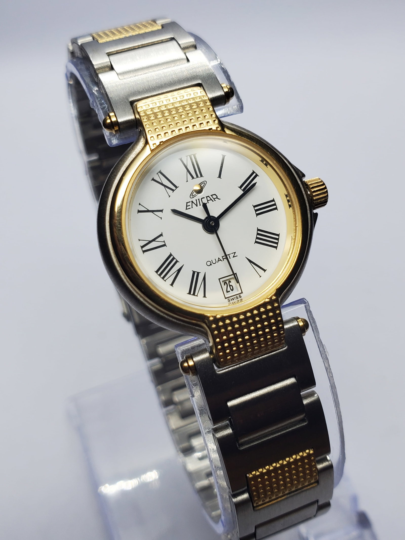 Vintage Enicar Swiss Dual Tone Dress Watch, 23mm, 1990s, Running: Elegant and distinctly Swiss, this Enicar 956.389 Quartz Dress Watch reflects the refined craftsmanship of one of Switzerland?s respected historic watchmakers. Founded in 1913 in La Chaux de Fonds, Sw