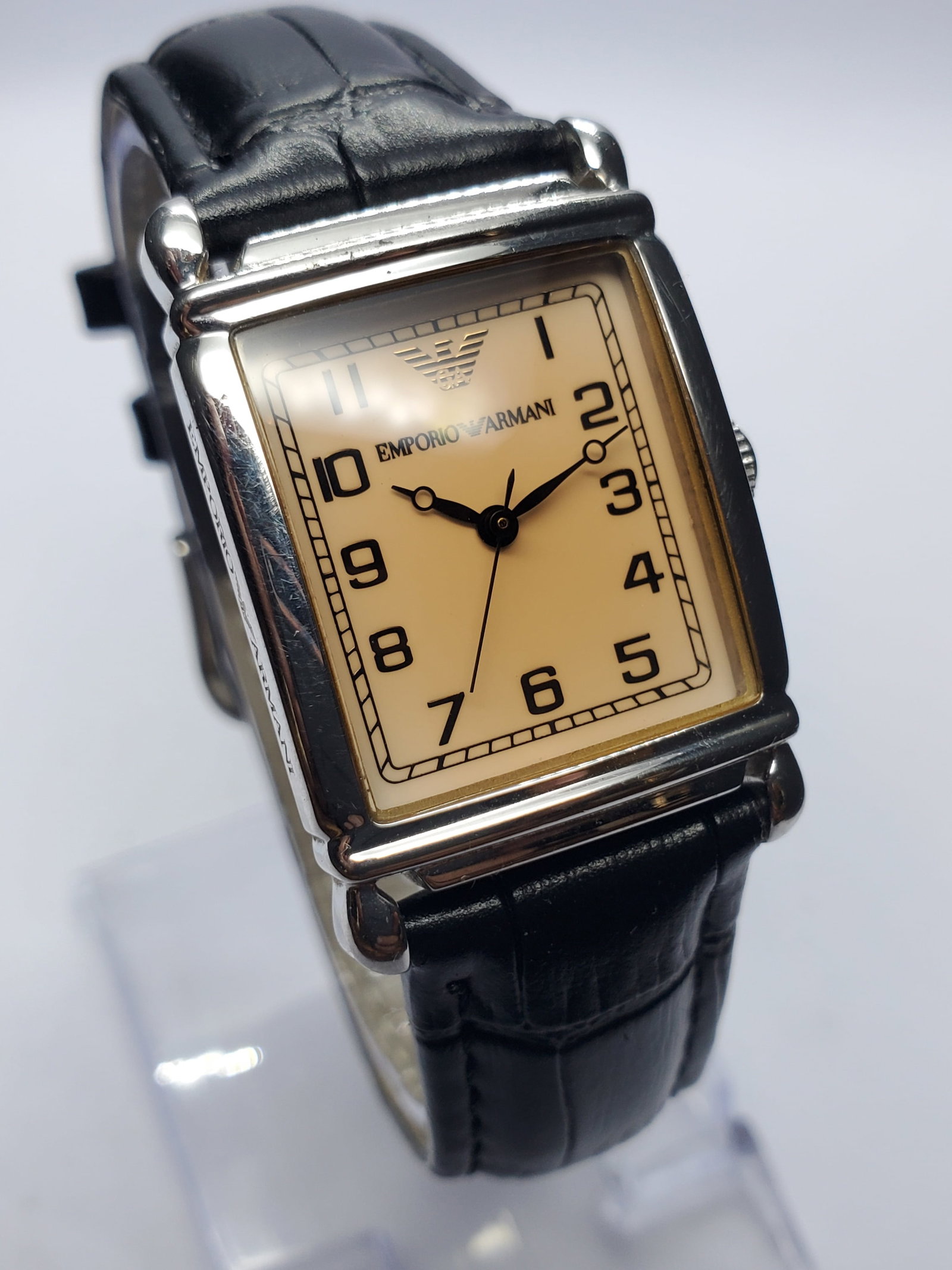 Vintage Emporio Armani Tank Case Champagne Dial Watch, 24x29mm, 2000s, Running: Elevate your collection with this elegant Emporio Armani AR0204 quartz dress watch, a refined designer timepiece that blends Italian fashion heritage with timeless sophistication. Founded by Giorgio A