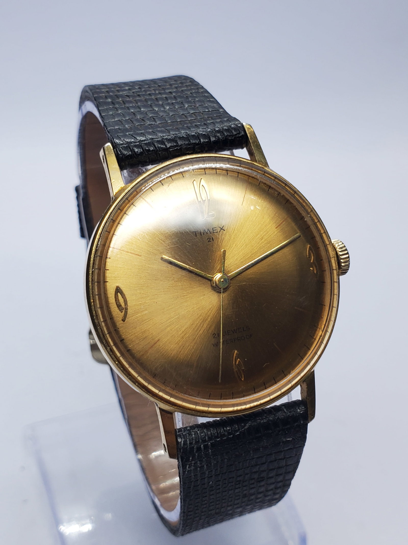 Vintage Timex 21 Jewel Manual Gold Dial Dress Watch, 33mm, 1960s, Running: Celebrate classic mid century styling with this vintage Timex 21 Jewel manual wind dress watch, a refined timepiece that reflects the dependable craftsmanship for which Timex has been admired for gene