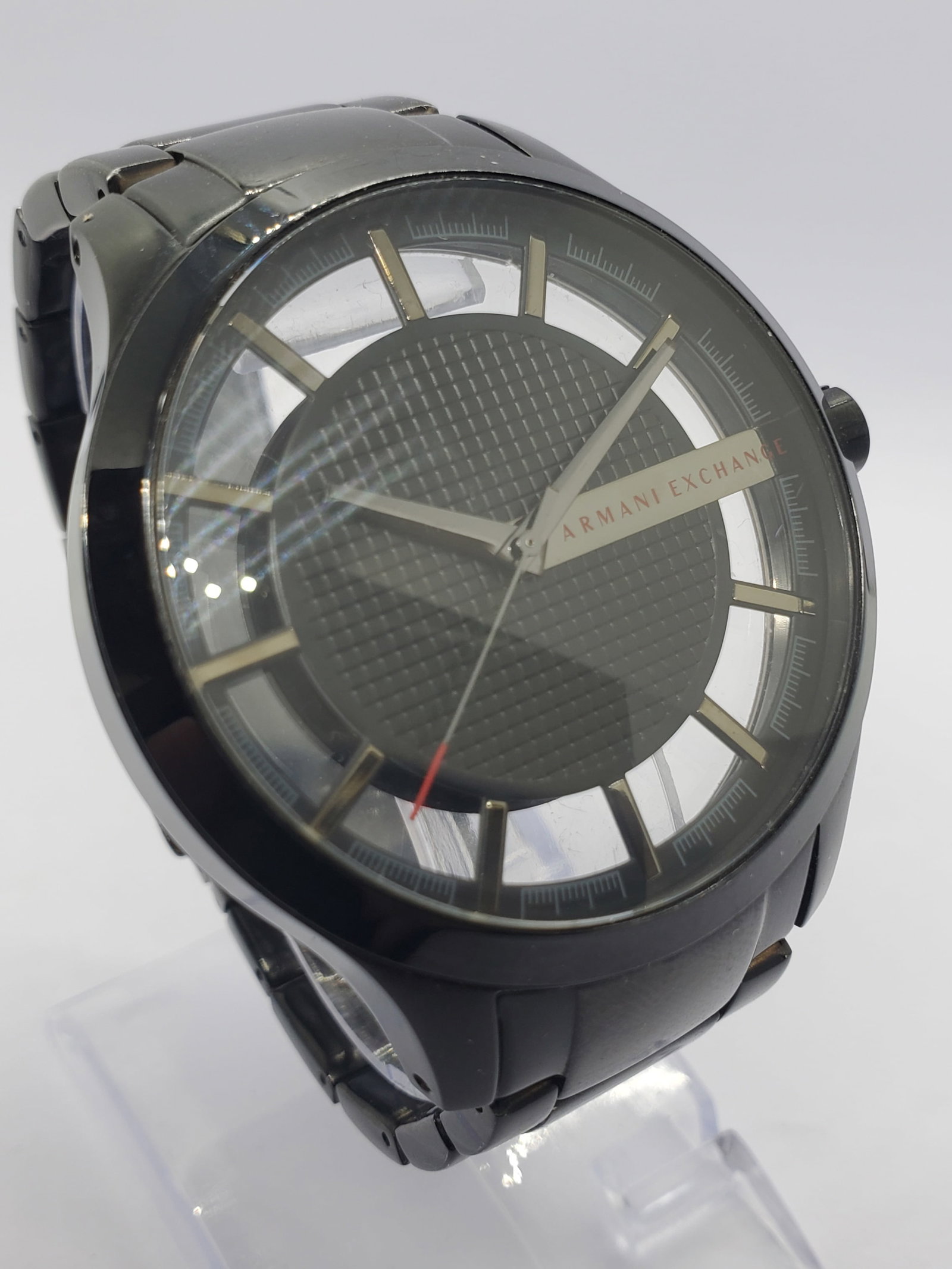 Vintage Armani Exchange AX2187 Black Skeleton Dial Quartz Watch 46mm, 2017 to 2019, Running: Armani Exchange AX2189 is a bold fashion sport quartz watch that blends modern elegance with urban durability, featuring a black case and a multi layer skeleton style dial with a floating chapter ring