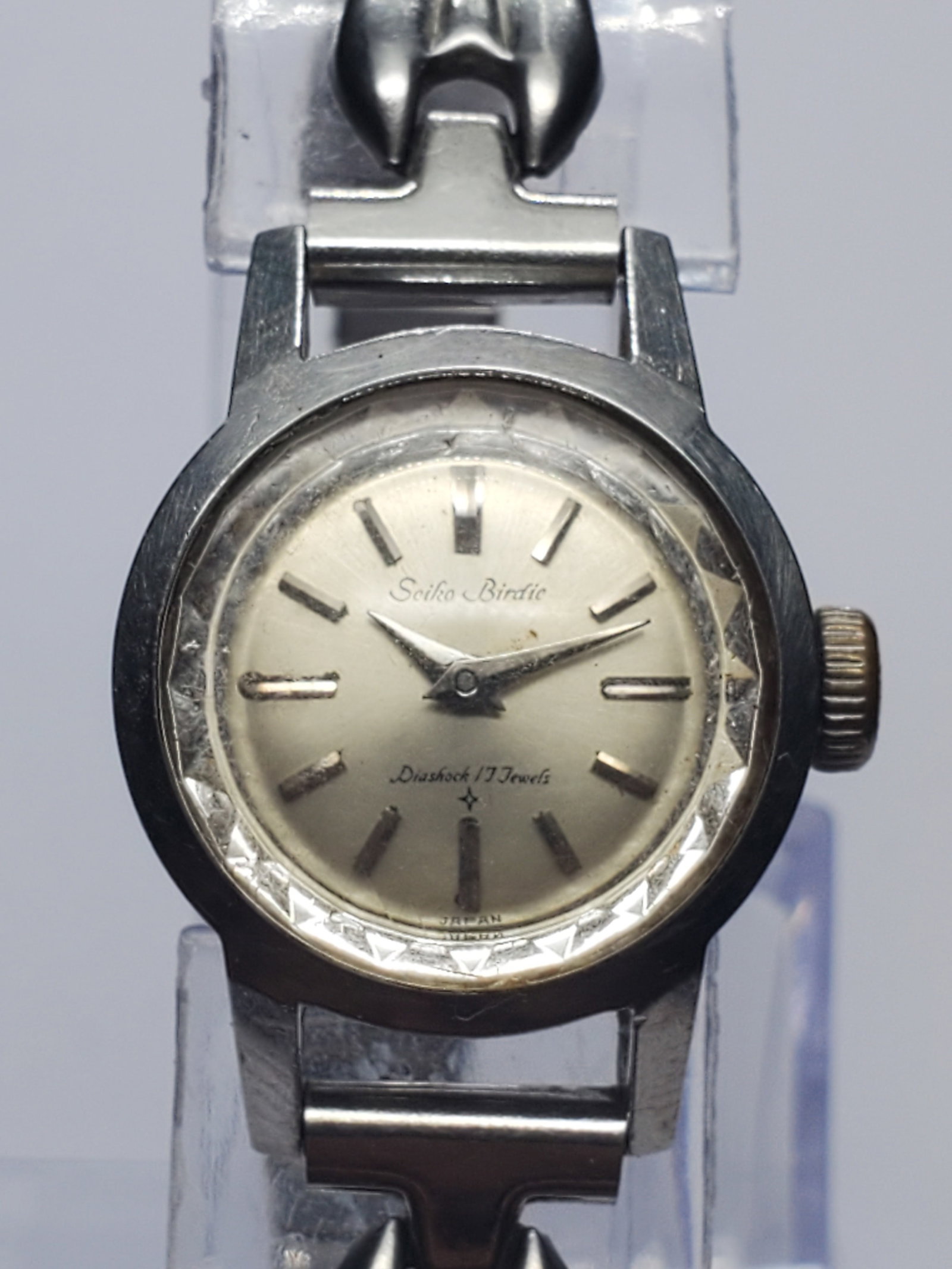 Vintage Seiko Birdie Diashock 17 Jewels Manual Watch, 20mm, circa 1960, Running: Add timeless Japanese elegance to your collection with this vintage Seiko Birdie manual wind dress watch. Featuring a silver tone 20 mm case, an elegant silver sunburst dial, Diashock shock protection