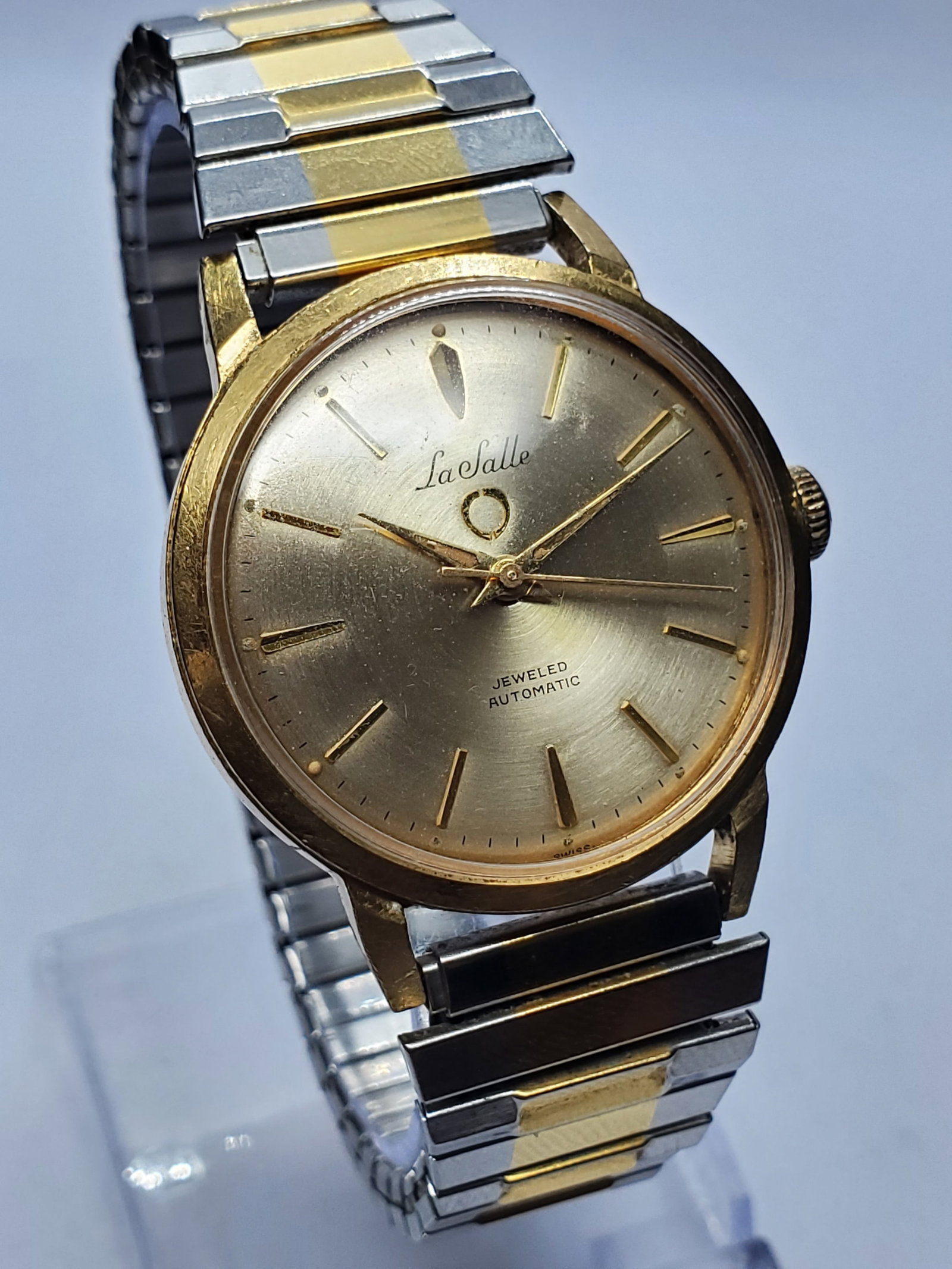 Vintage Westclox La Salle Automatic Gold Plated Watch, 33mm, 1960s, Running: Elegant and timeless, this vintage Westclox La Salle Automatic Dress Watch features a gold plated 33 mm case, a refined silver tone sunburst dial with applied gold markers, automatic jeweled movement,
