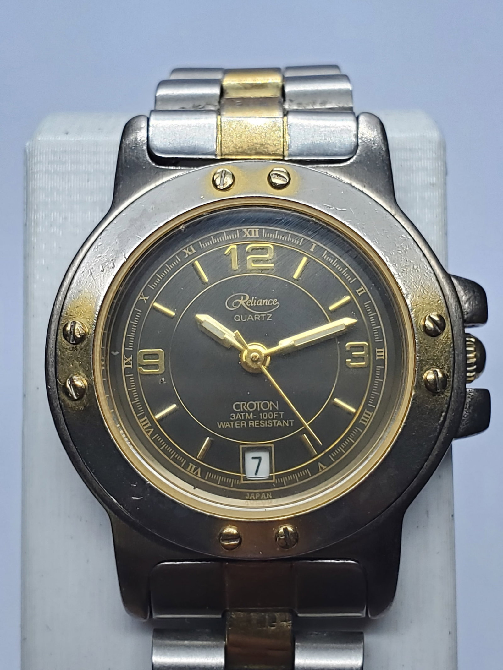 Vintage Croton Reliance Two-Tone Gray Dial Watch 25mm, 1990s, Running: Vintage Reliance by Croton ladies? quartz dress watch combining sporty architectural styling with understated elegance. Its compact 25 mm silver-tone case features gold-tone accents and exposed decora