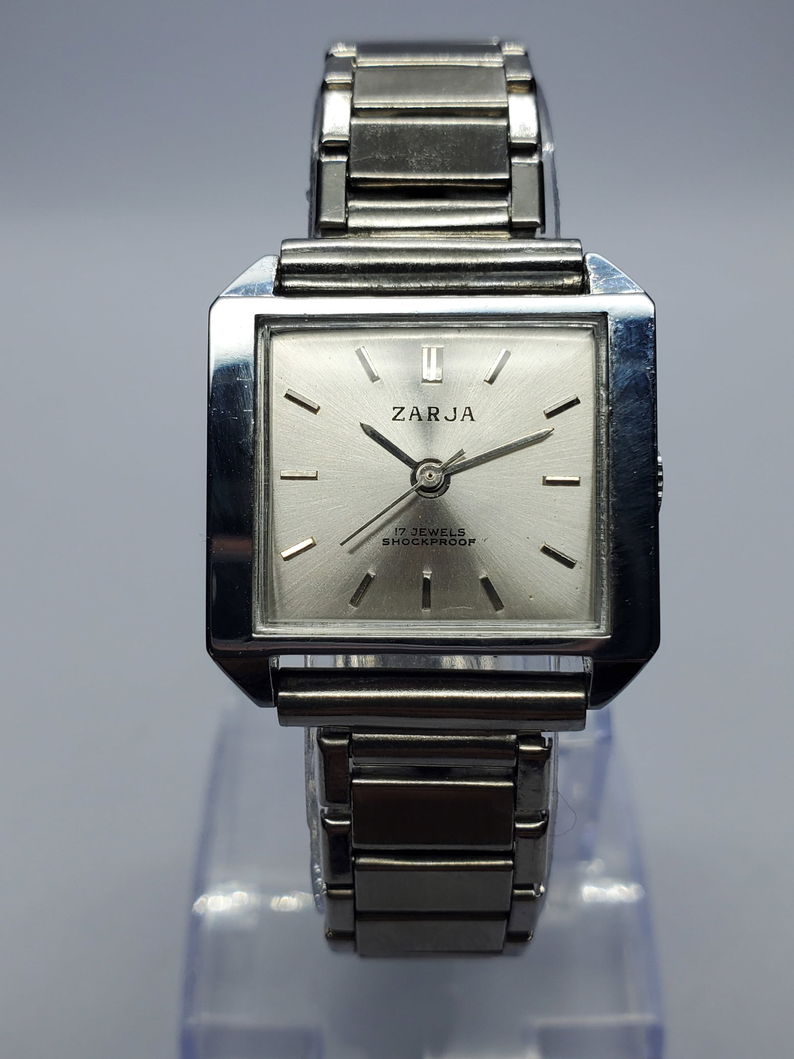 Vintage Soviet Zarja 17-Jewel Manual Watch, 25x20mm, 1970s, Running: Distinctive vintage Zarja dress watch featuring a silver-tone 25 x 20 mm TV style case, sunburst silver dial, applied markers, 17-jewel shockproof hand-wound mechanical movement, and a 6.5-inch metall