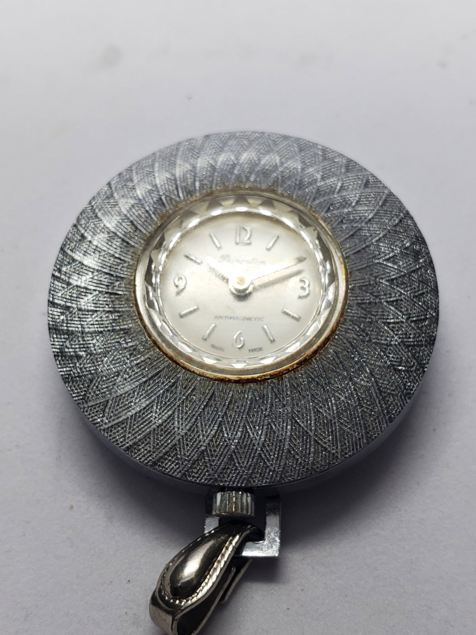 Vintage Princeton Swiss Manual Pendant Watch Guilloche Case Art Deco Style, 34mm, 1960s, Running: An uncommon and charming vintage Princeton manual wind pendant watch that blends jewelry artistry with classic Swiss timekeeping. Princeton was one of several private label brands associated with mid 