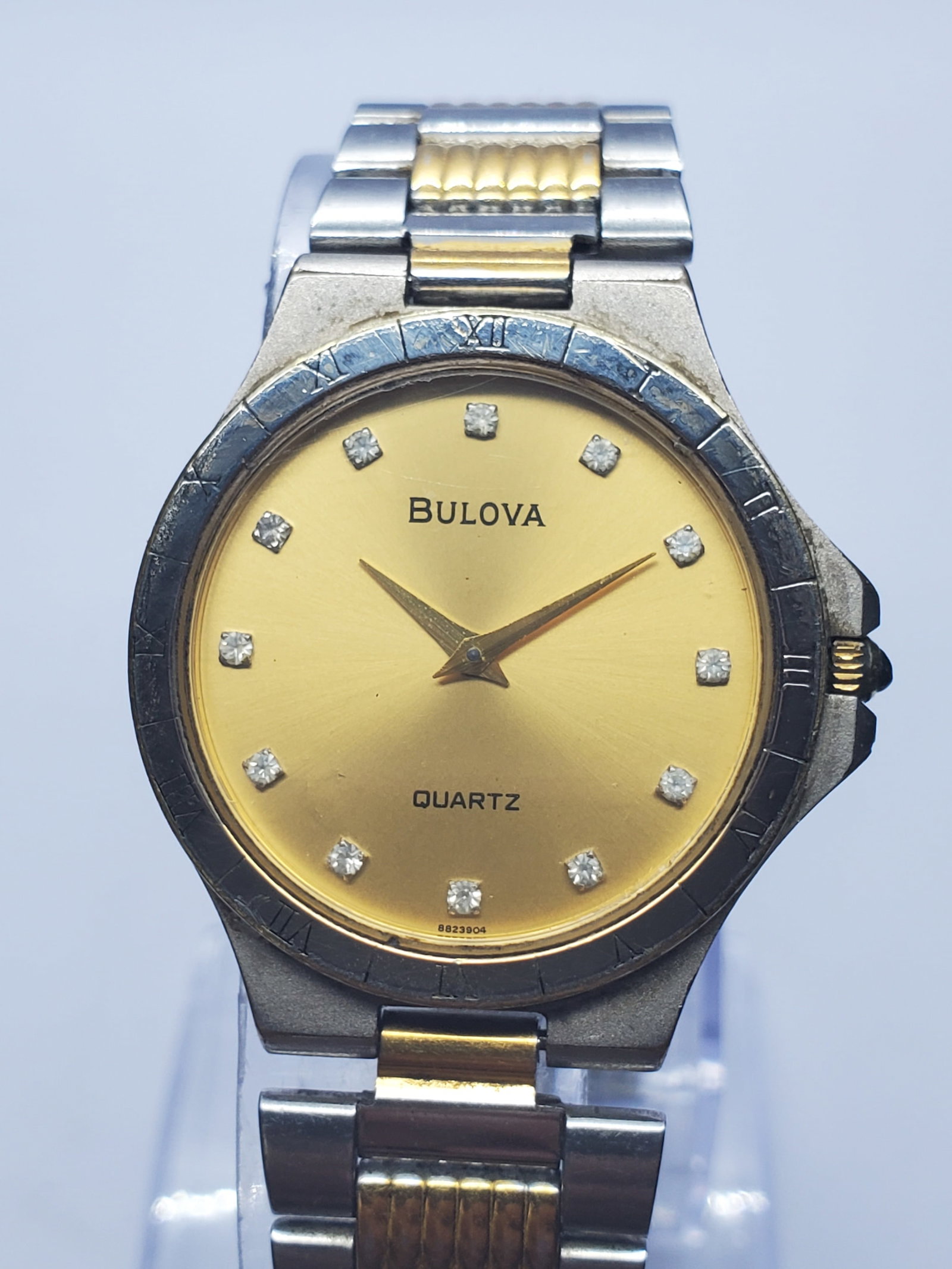 Vintage Bulova Diamond Quartz Unisex Watch, 30mm, 1980s, Running: This vintage Bulova Diamond quartz dress watch combines timeless elegance with the prestige of one of America?s most respected watchmakers. Founded by Joseph Bulova in New York City in 1875, Bulova be