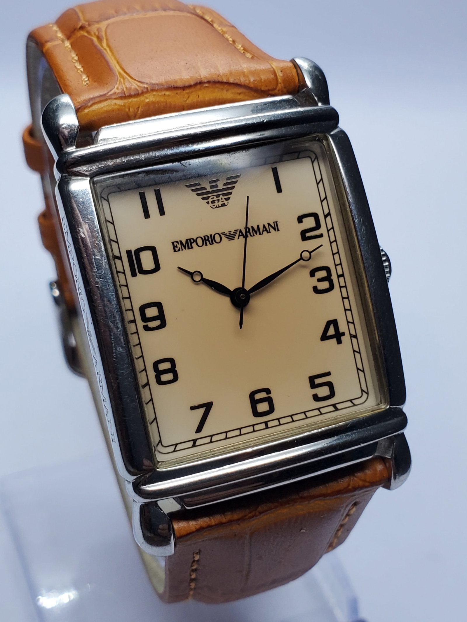 Vintage Emporio Armani Tank Case Champagne Dial Watch, 29x36mm, 2000s, Running: Elevate your collection with this elegant Emporio Armani AR0203 quartz dress watch, a refined designer timepiece that blends Italian fashion heritage with timeless sophistication. Founded by Giorgio A