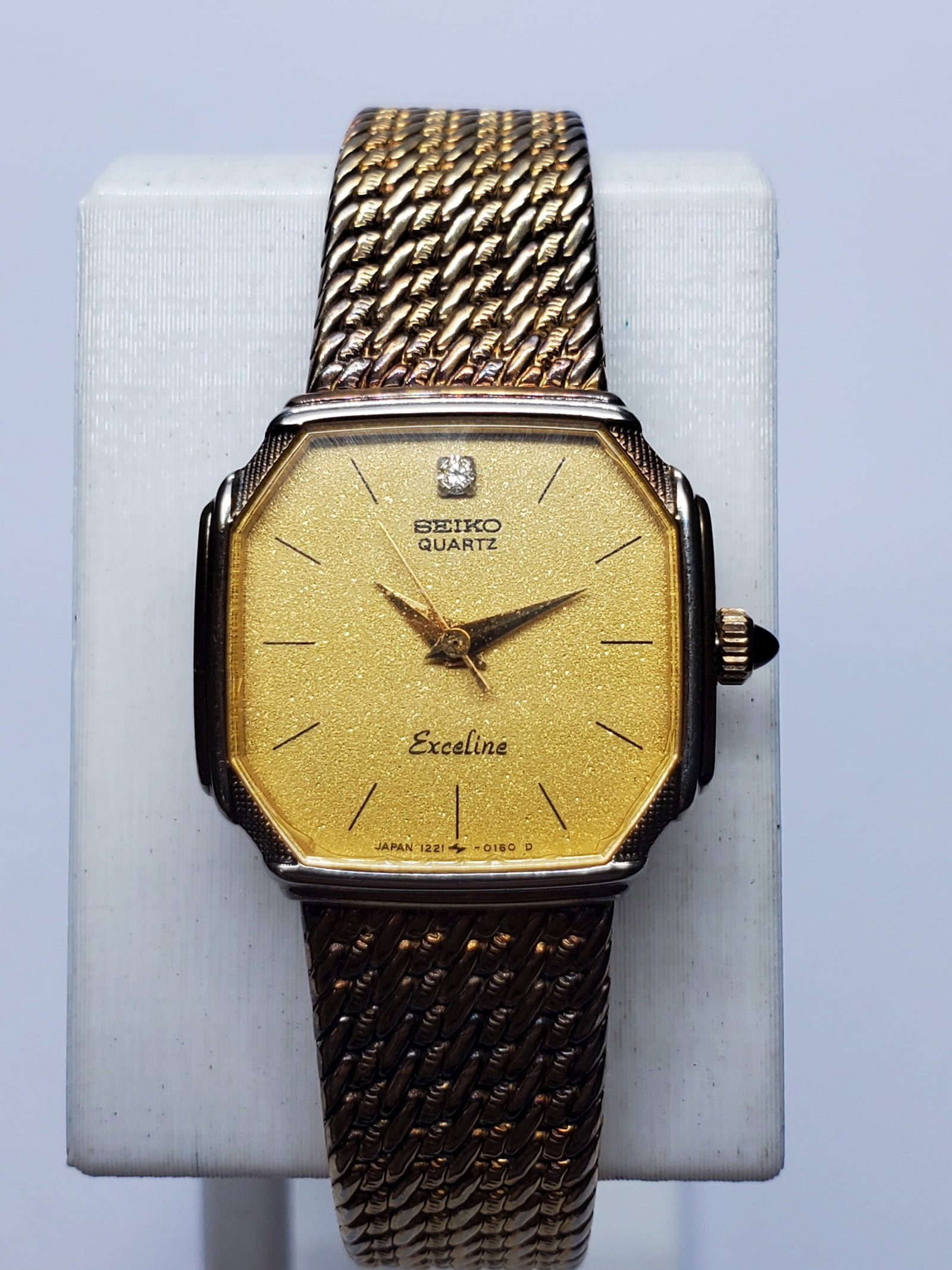 Vintage Seiko Exeline Gold Plated Diamond Watch, 20x20mm, 1982, Running: Elegant and refined, this vintage Seiko Exeline 1221-5080 quartz dress watch showcases the timeless craftsmanship for which Seiko is renowned. It features a gold plated 20 mm x 20 mm case, a sparkling