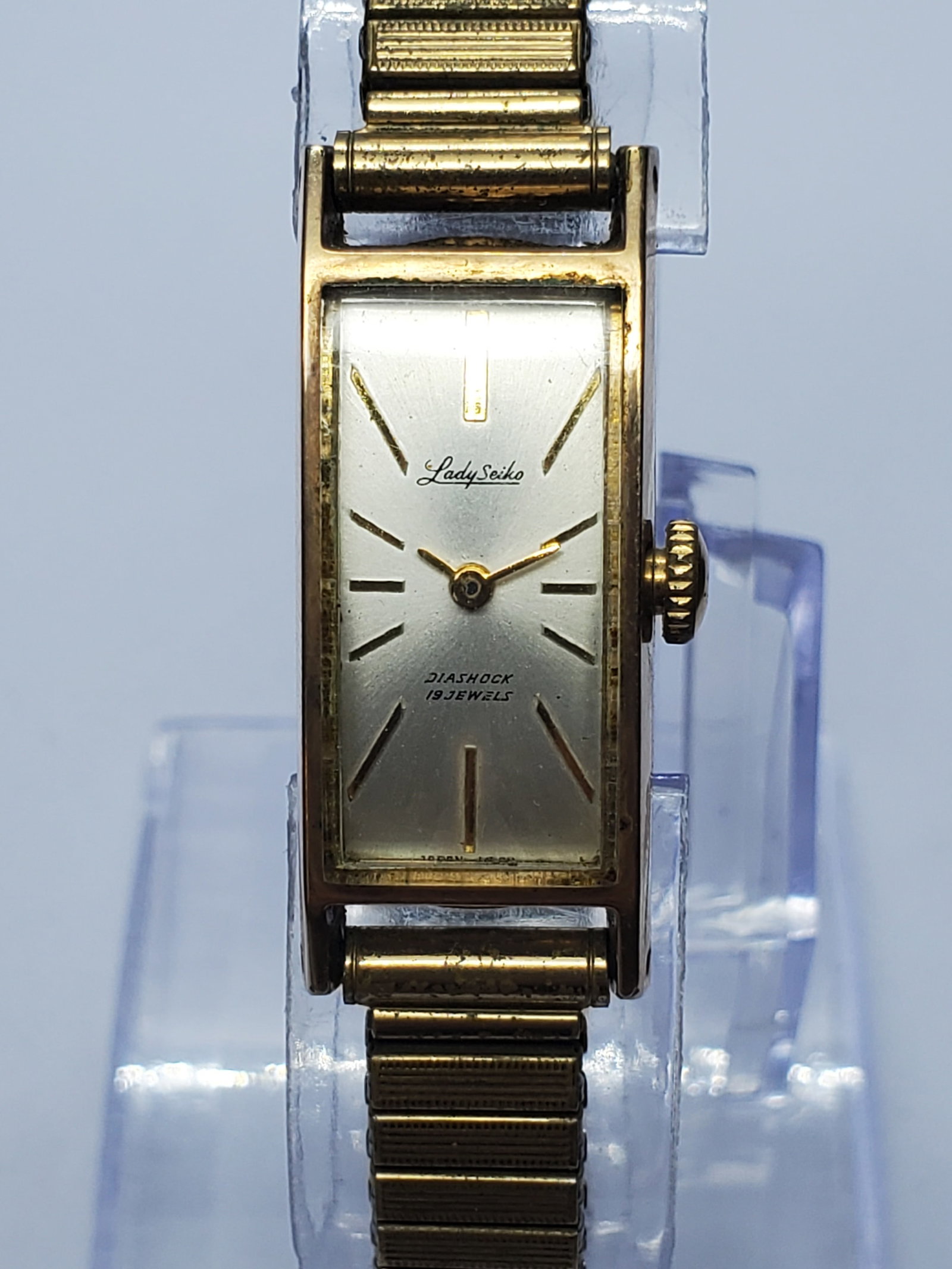 Vintage Lady Seiko 19J Manual Gold Tank Award Watch, 14x25mm, 1963, Running: Elegant and historically distinctive, this 1963 Lady Seiko manual-wind dress watch features a slender gold-plated rectangular case, silver-tone dial, gold markers and hands, Diashock protection, and a