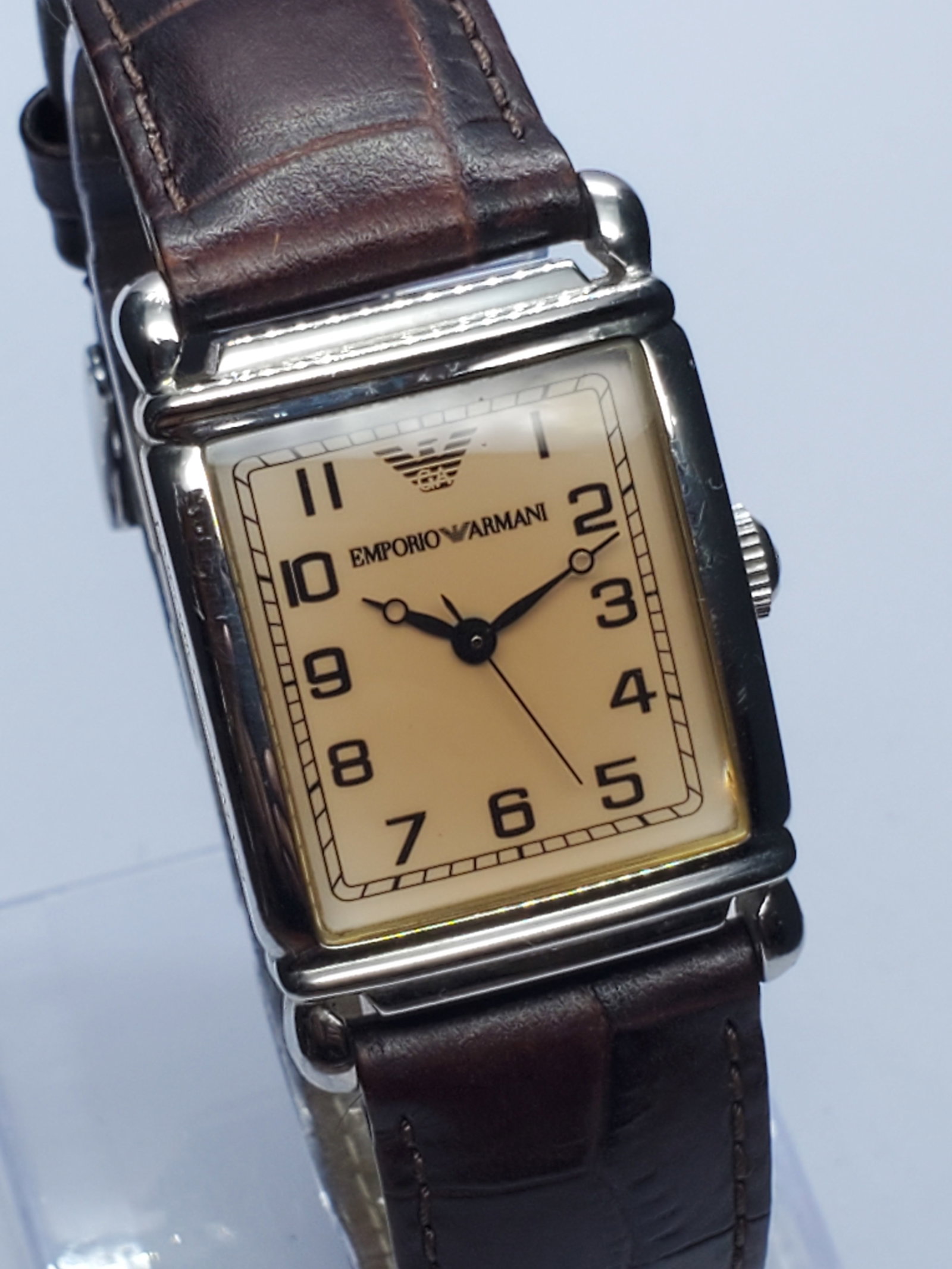 Vintage Emporio Armani Tank Case Champagne Dial Watch, 24x29mm, 2000s, Running: Elevate your collection with this elegant Emporio Armani AR0204 quartz dress watch, a refined designer timepiece that blends Italian fashion heritage with timeless sophistication. Founded by Giorgio A