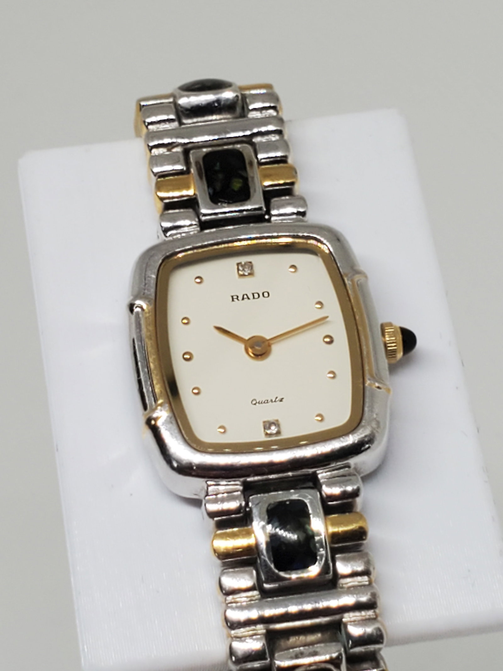 Vintage Rado Two Tone Silver & Gold Ladies Watch, wrist 5, 1980s, Running: Running condition Discover the epitome of elegance and sophistication with the Rado 133.9666.2, a luxurious timepiece designed to captivate. Featuring a stunning dual tone gold and silver square case,