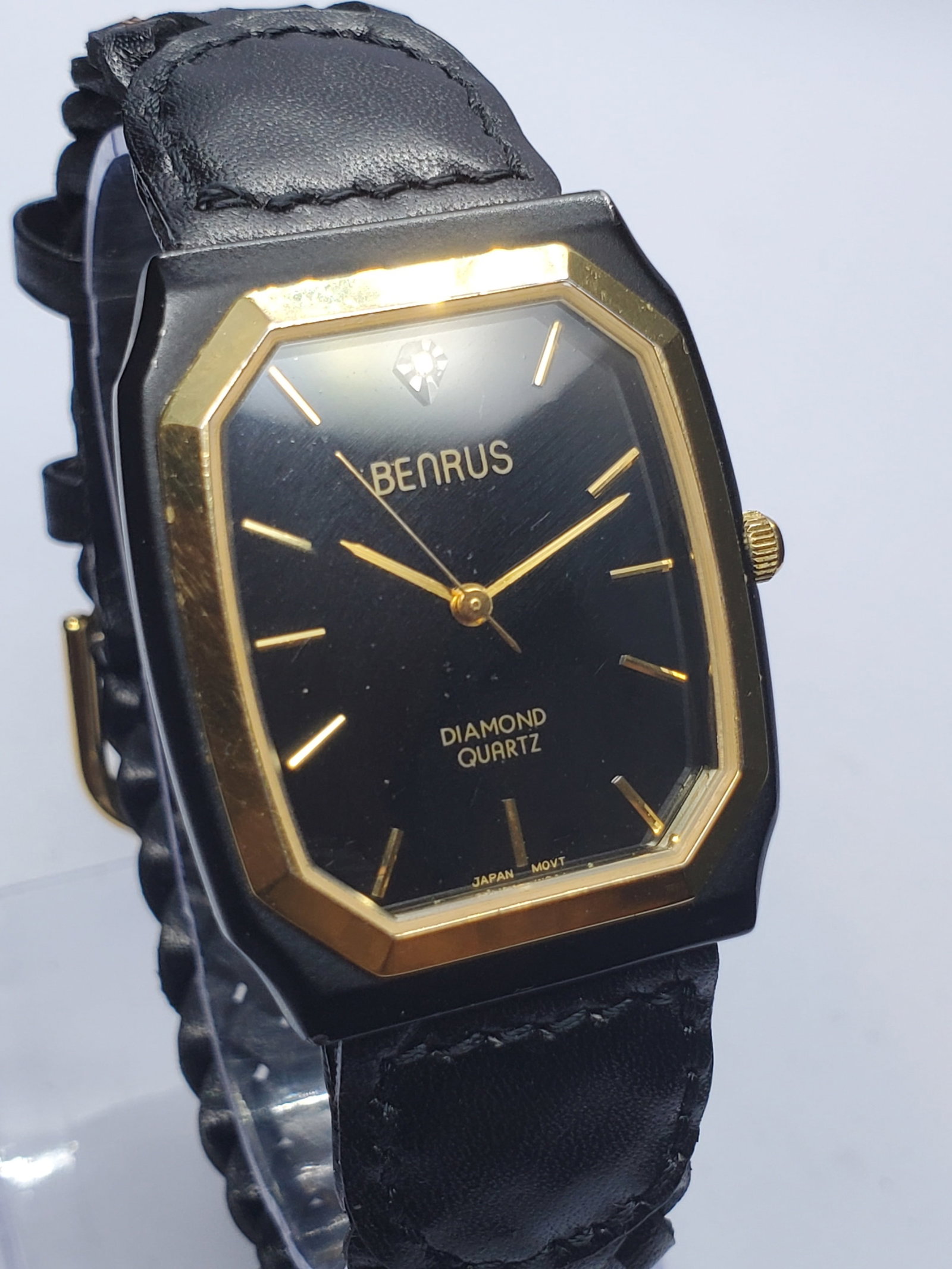 Vintage Benrus Diamond Black and Gold Tank Dress Watch, 30x35mm, 1988 to 1993, Working: Discover classic Art Deco inspired styling with this vintage Benrus Diamond Quartz dress watch, an elegant timepiece from one of America's historic watch brands. Benrus was founded in 1921 by the Lazr