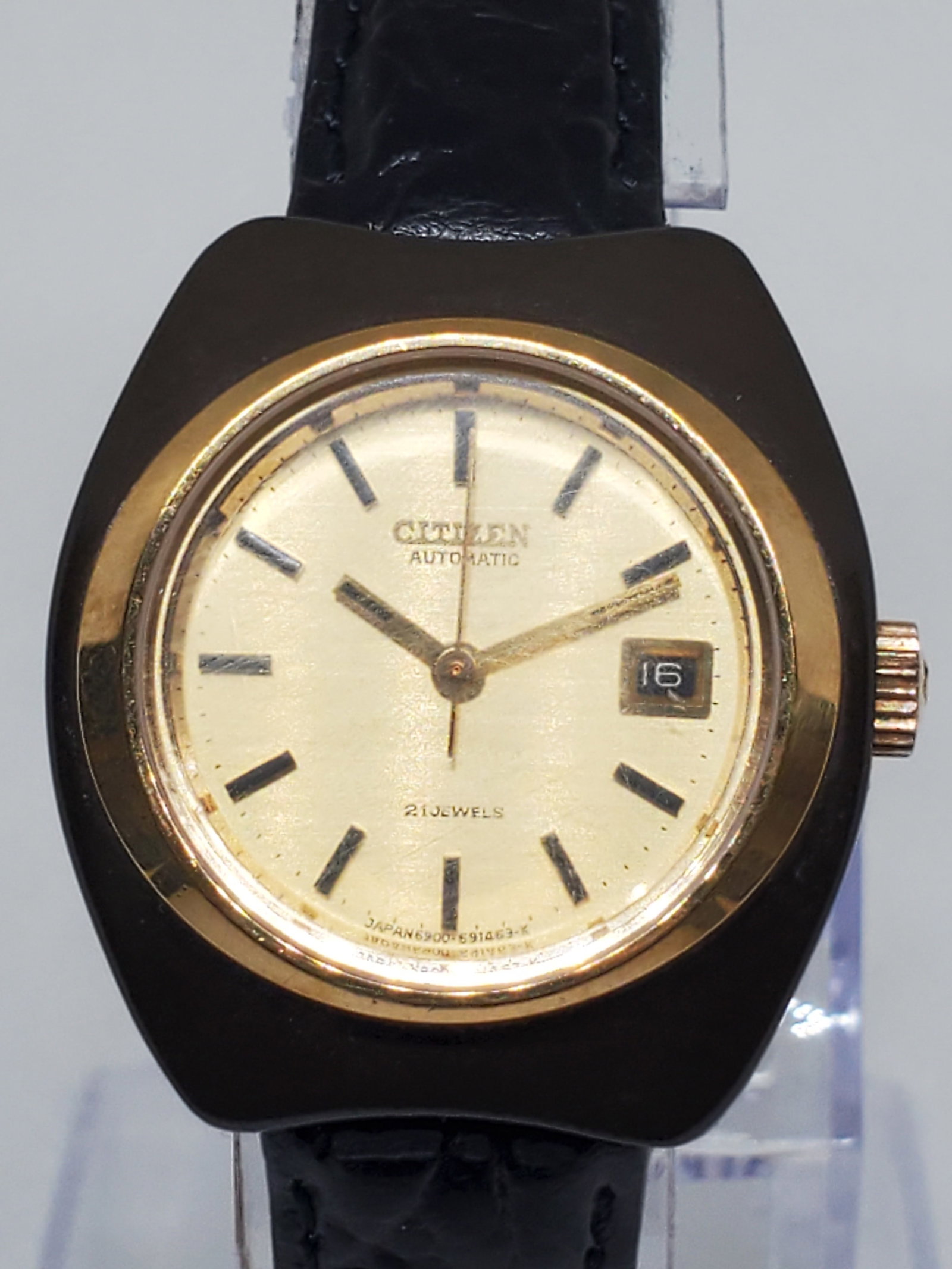 Vintage Citizen Automatic Coated Case Gold Dial Date Watch 28mm x 31mm, 1970s, Running: This vintage Citizen Automatic watch combines elegance, innovation, and the durability that has made Citizen one of the most respected names in horology. Featuring a rare coated case paired with a gol