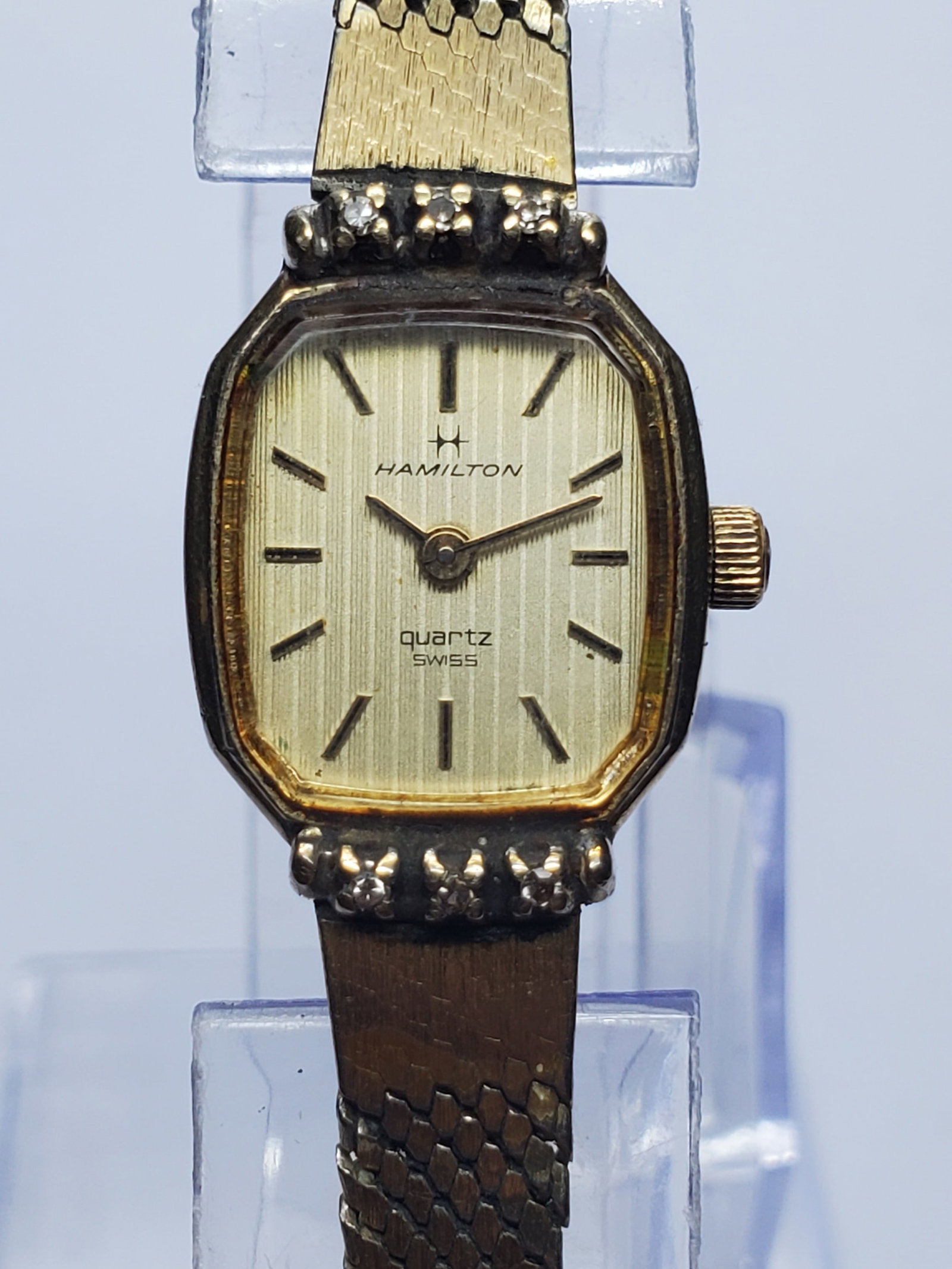 Vintage Hamilton 8484 Six Diamond Swiss Quartz Ladies Watch, 16x22mm, 1980s, Running: Elegant vintage Hamilton 8484 ladies? quartz dress watch featuring a petite 16 x 22 mm gold-plated case, vertically textured gold-pattern dial, applied gold-tone markers, and six small diamond accents