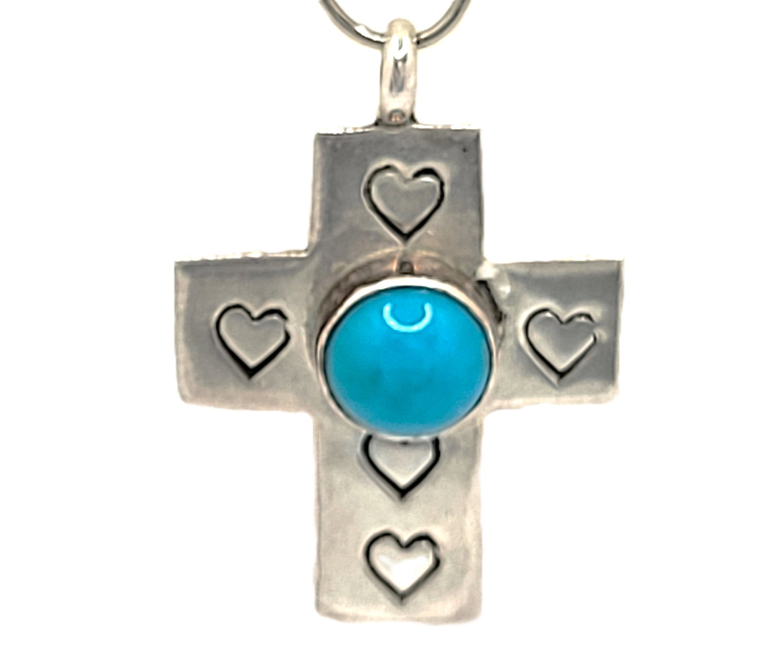 Signed Ruth Ann Begay Turquoise Cross Navajo: This is a signed Ruth Ann Begay, Native American Navajo, sterling silver cross that focuses on love and features an approximate 8mm cabochon, polished and stabilized Sleeping Beauty Mine Turquoise.&nb