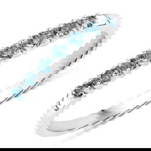 Elegant Band-White Gold & Blue Diamond Ring: 14K WHITE GOLD - DIAMONDS:EARTH-MINED, ENHANCED. SIZE 7 This 14 karat white gold ring features .22 carats total weight of round, brilliant-cut, earth-mined, I1-I2 clarity, blue diamonds. The dia