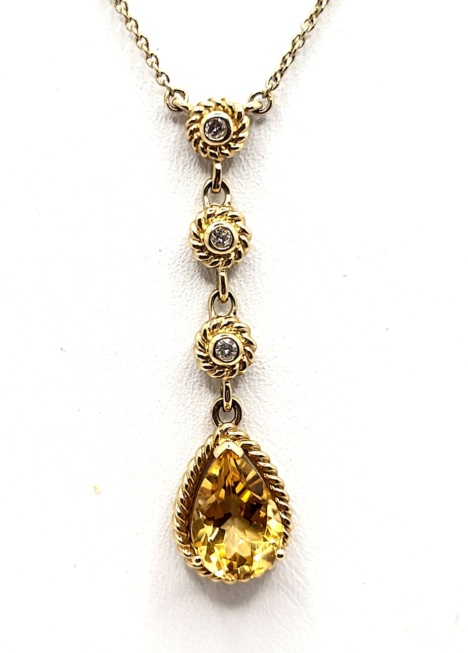 Lavalier Drop Citrine and Diamond Station Necklace: Celebrate that November loved one with this warm and bright citrine necklace! Setting: 14K Yellow Gold Main Gemstone: Genuine Citrine Adjacent Gemstone: Genuine, Natural Diamond Length: 16