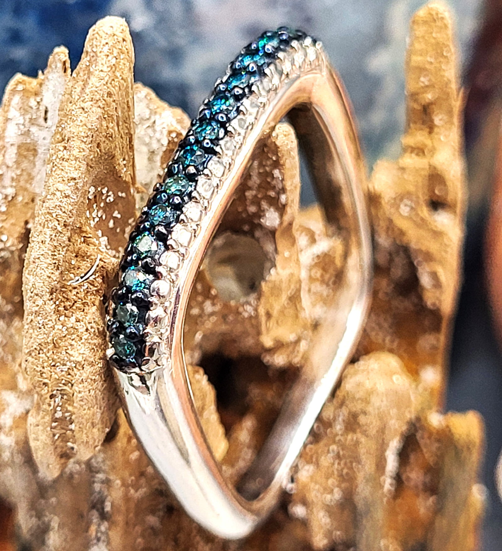 Blue Diamond Square Pendant: Setting: Sterling Silver .925 Main Gemstone: Genuine Blue Diamonds (Enhanced)* Weight: 6.17g This sterling silver pendant is an open, square-shaped ring and no bail, featuring approximately