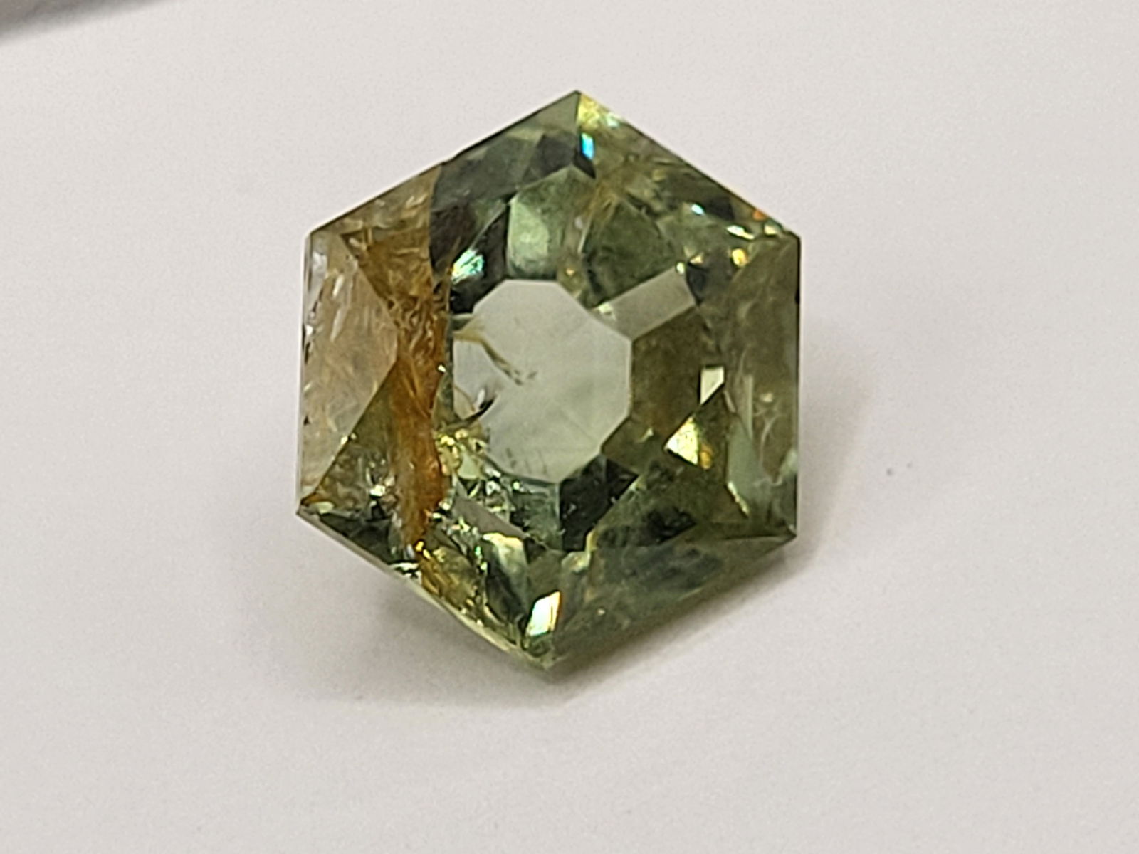 3.25CT Unheated Montana Sapphire -Bi-Colored Bold: Mineral/Gemstone: Genuine Corundum Sub-Category/Color: Sapphire Color Designation/Phenomena: Yellow-Green/Color Changing or Bi-Colored Geographic Origin: Montana, USA State: Loose, Cut & Faceted, Natu