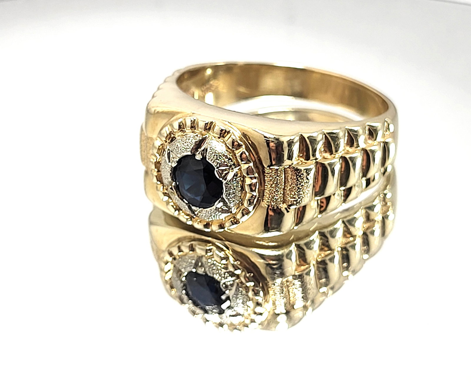 Man's Blue Sapphire Ring with Jubilee Shoulders: Setting: 14K Yellow Gold Main Gemstone: Genuine Blue Sapphire Size: US 13.5 Weight: 13.74 Very heavy and ready for a large hand, SIZE 13.5! This is a solid ring with a firm look for a man who likes to