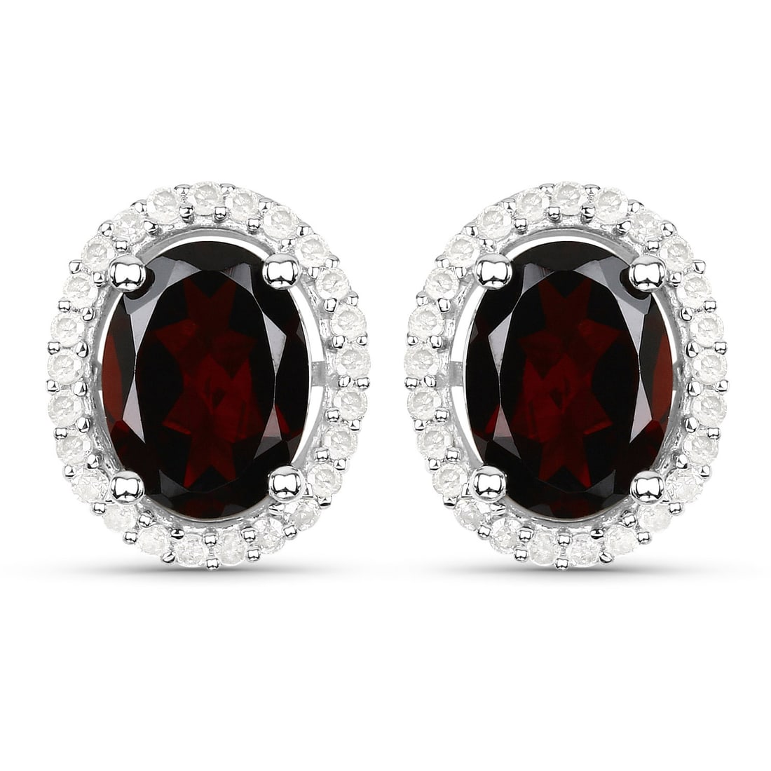 January Elegance Garnet and Diamond Halo Earrings: 21100004 Setting: .925/18K White Gold over Sterling Silver Primary Gemstone: Genuine Garnet Secondary Gemstone: Genuine Natural Diamond Closure: Posts with Friction Backs Weight: 3.07g Birthstone for: