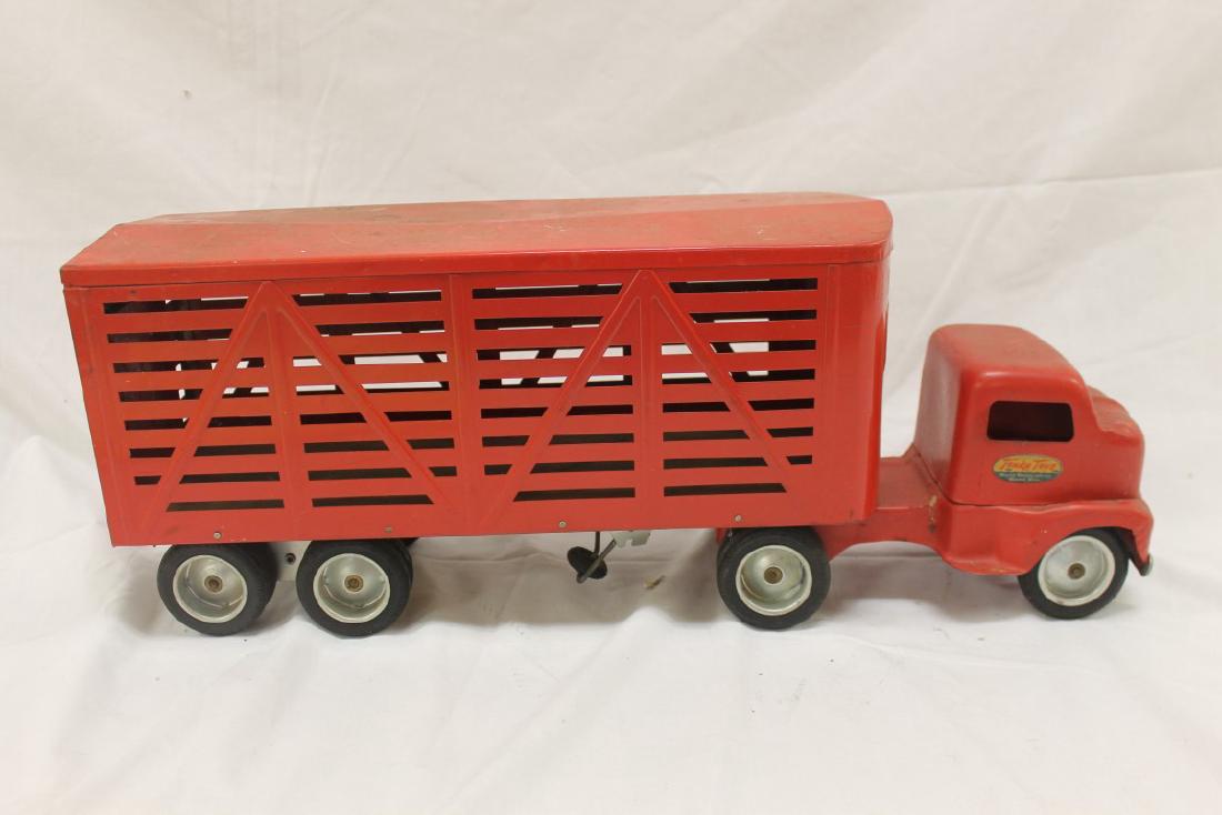 Tonka Toys Livestock Hauler, app. 22" long, with minor: Tonka Toys Livestock Hauler, app. 22" long, with minor paint loss.