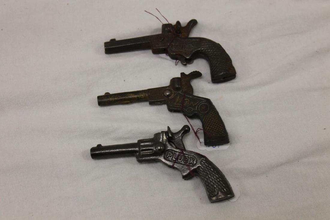 Cast iron cap guns:  Dent "Big Chief", c. 1930, 3 1/2", (1 of 2)