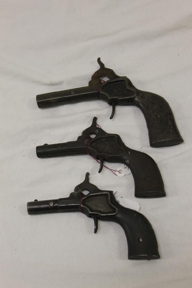 (3) Stevens unnamed c. 1876-78 cast iron cap guns, the (1 of 2)