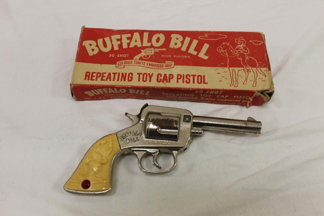 Stevens "Buffalo Bill" cast iron cap gun, app. 7 3/4",: Stevens "Buffalo Bill" cast iron cap gun, app. 7 3/4", c. 1940, with original box (as is). Some rusting.