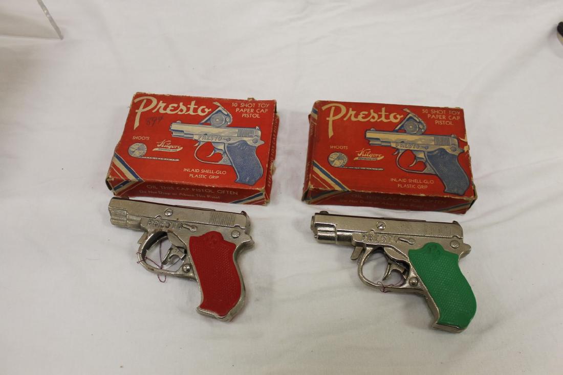 (2) Kilgore "Presto" 50 Shot cast iron cap pistols, c. (1 of 2)