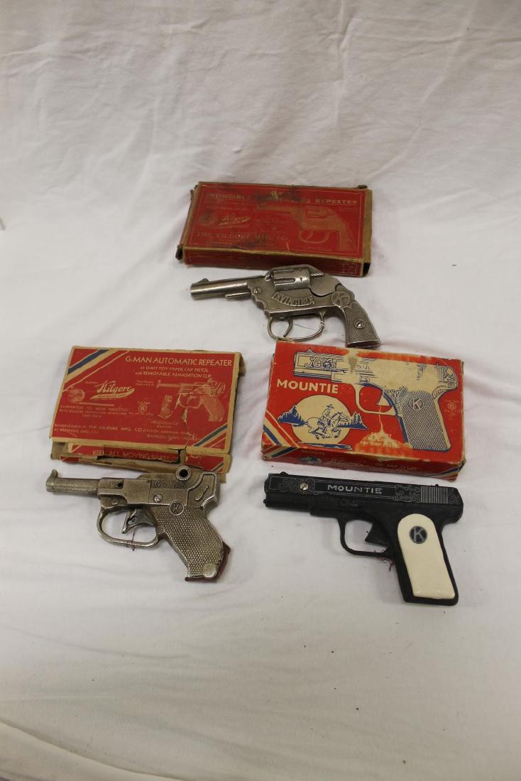 Kilgore cap guns: "Invincible" and "G-Man" cast iron, (1 of 4)