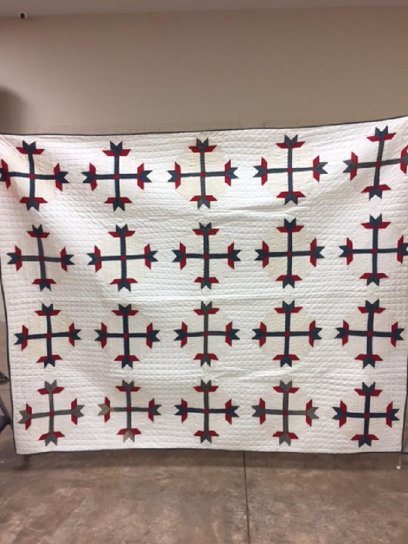 Stylized 4-bud tulip quilt, 67" X 86". Note on quilt: Stylized 4-bud tulip quilt, 67" X 86". Note on quilt reads "Pattern unknown. Red & Green on White from Somerset, Ky. Purchased from Bess Bilbrey, Lex. Ky, made by a Mrs. Spears from Somerset"