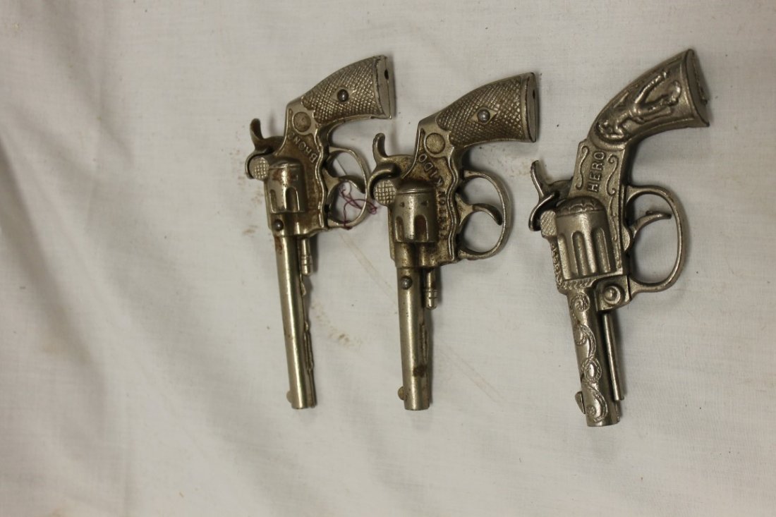 Mammoth Cap Guns: Mammoth Cap Guns: Kenton Bronc, 1935, 6"; Stevens Hero, 1940, 5 1/4", Kenton Kido, 1936, 5 3/8"