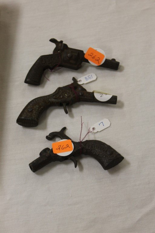 Cap Guns:: Cap Guns: Hubley Star, 1920, 3 3/4"; Perfection, no information found, 3", loose firing mechanism; unknown, 3 5/8", with octagonal to round barrel