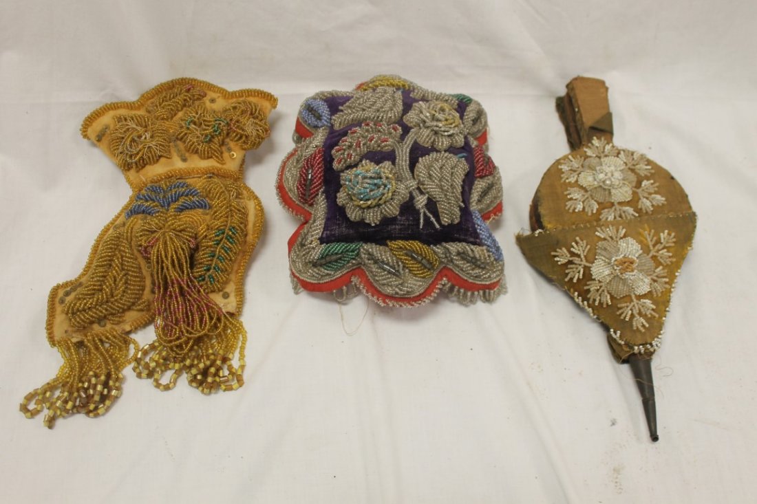 (3) c. 1890 Northeast Indian beaded items:: (3) c. 1890 Northeast Indian beaded items: 11" boot form pocket with beads and sequins, expected looseness and minor loss, overall excellent; 11 1/2" pillow with elaborated floral beadwork, some loss
