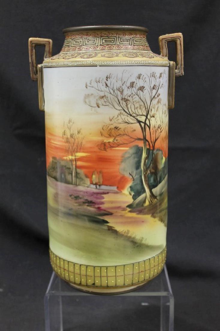Nippon E-Oh China 2-handle cylinder vase, app. 11 3/4",: Nippon E-Oh China 2-handle cylinder vase, app. 11 3/4", with minor loss. With enamel bead and line decoration bordering a water side landscape.
