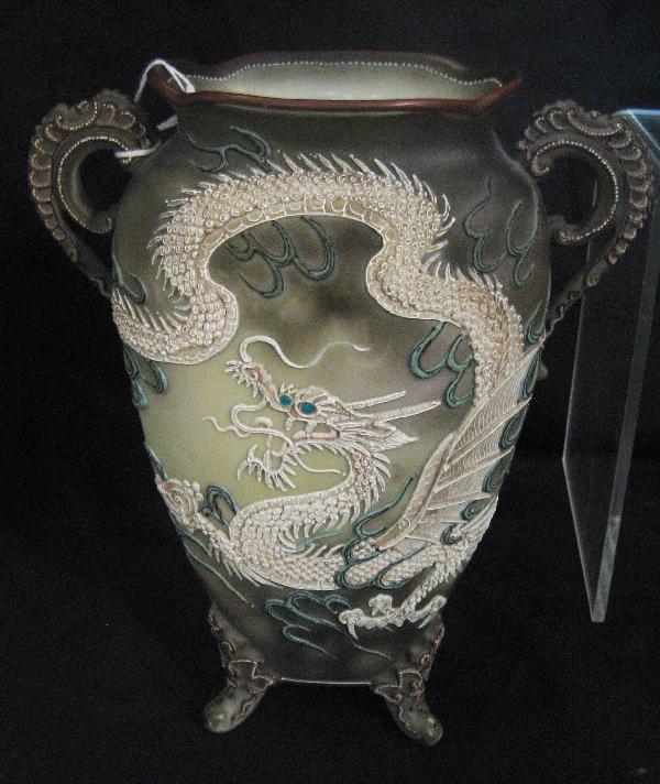 Nippon Blue maple leaf 9 3/4" 2-handle vase with : Nippon Blue maple leaf 9 3/4" 2-handle vase with moriage dragon. Line loss of smoke tendril and behind foot, and at rear bottom.