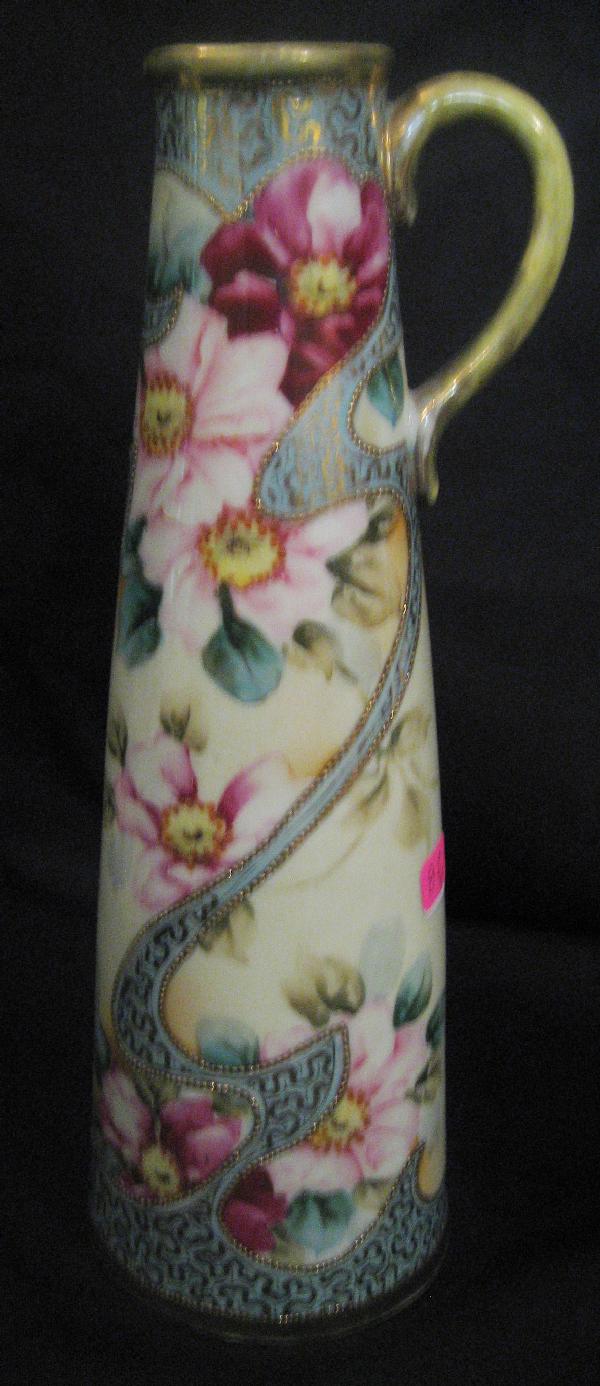 Unmarked Nippon 11 1/8" turquoise and gold decora: Unmarked Nippon 11 1/8" turquoise and gold decorated floral ewer. Gold wear on handle and rim.