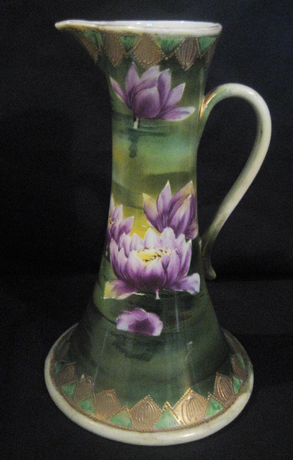 Nippon Blue maple leaf 9 3/4" ewer with water : Nippon Blue maple leaf 9 3/4" ewer with water lilly and gold decoration.