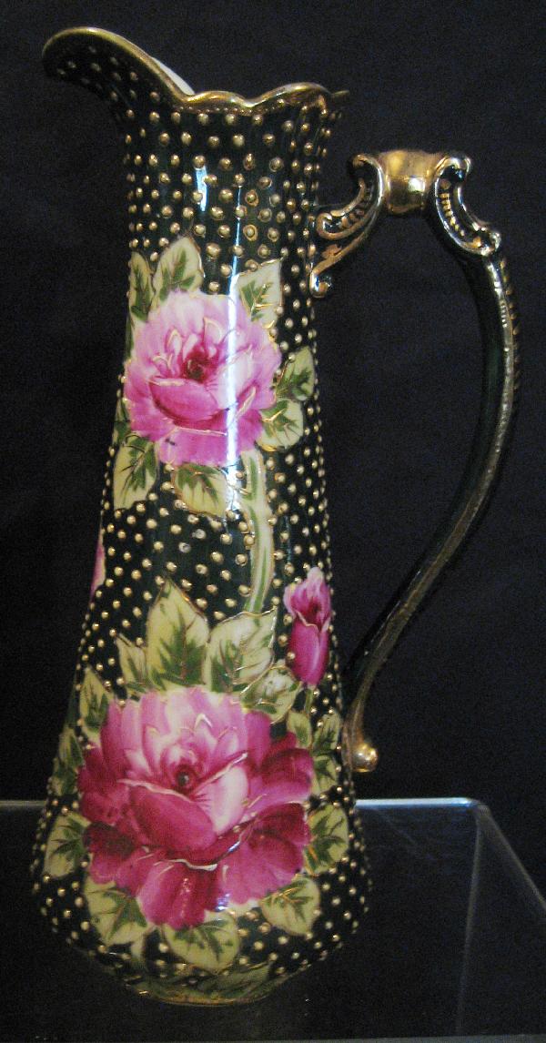 Unmarked Nippon 10 7/8" rpse decprated ewer : Unmarked Nippon 10 7/8" rose decorated ewer with roses and all-over beaded enamel decoration on deep green groun.